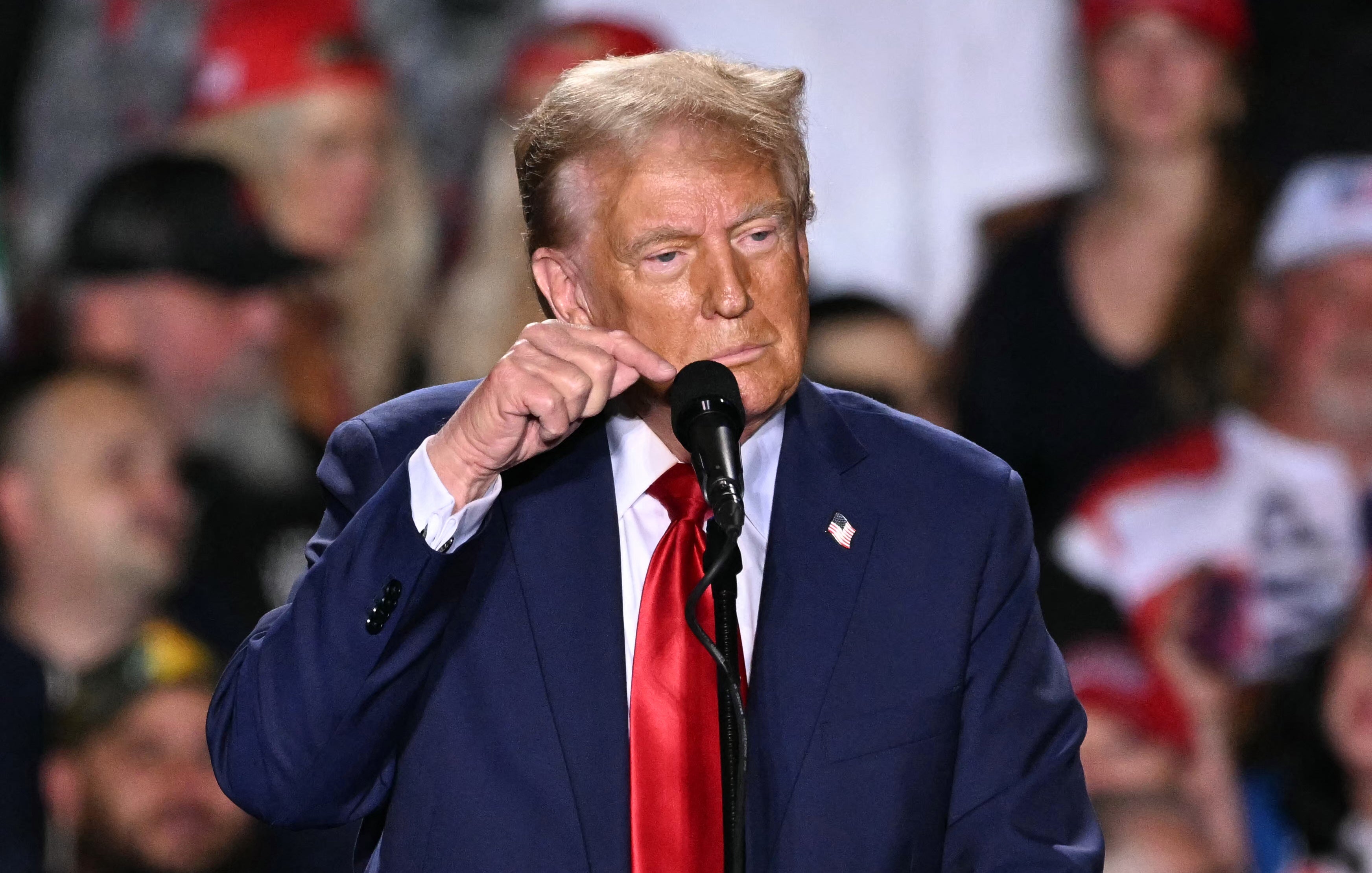 Trump at a campaign rally at Huntington Place in Detroit, Michigan, on October 18. Trump, meanwhile, has come under fire for backing out of his own interview with 60 Minutes