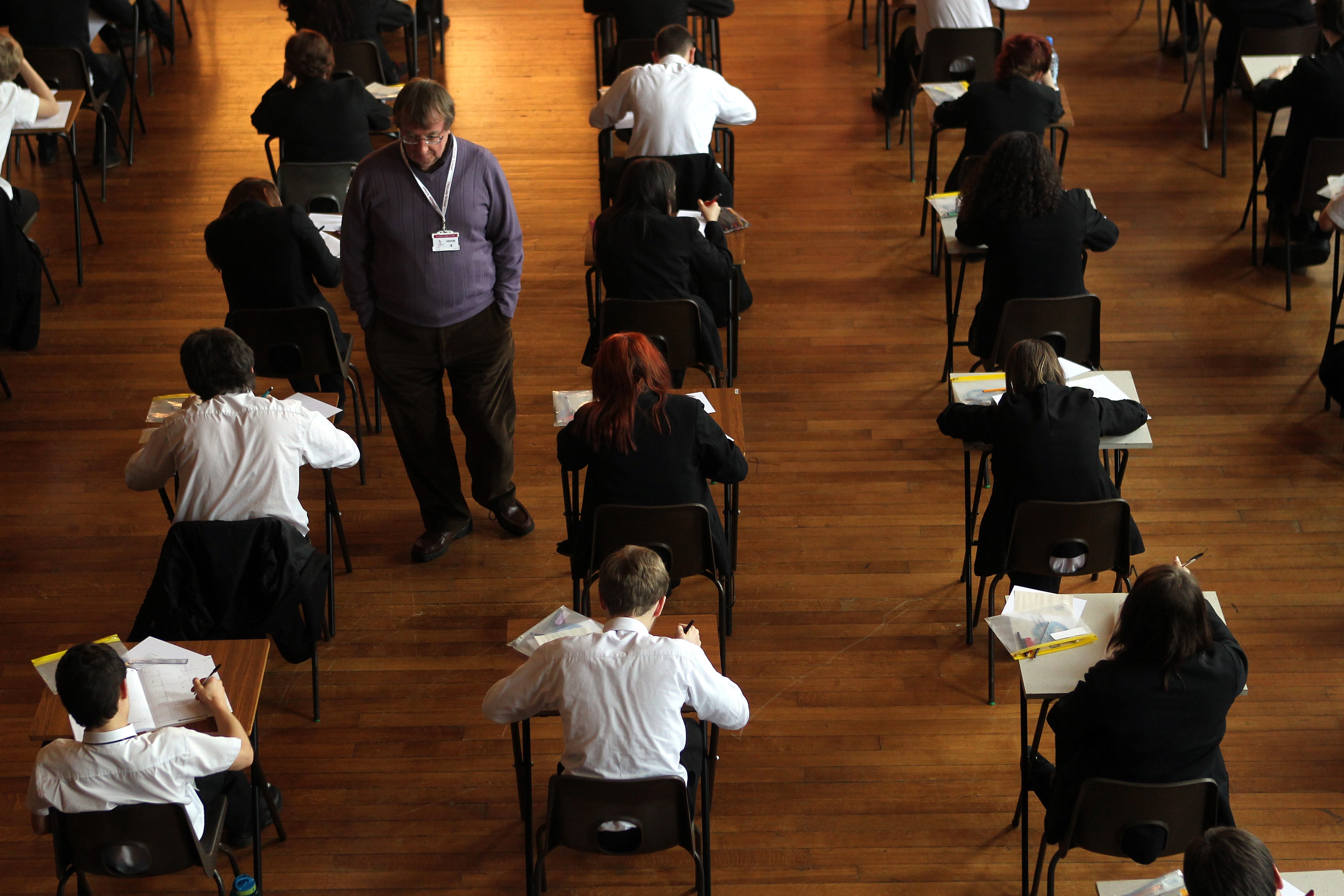 Pupils sitting an exam (PA)