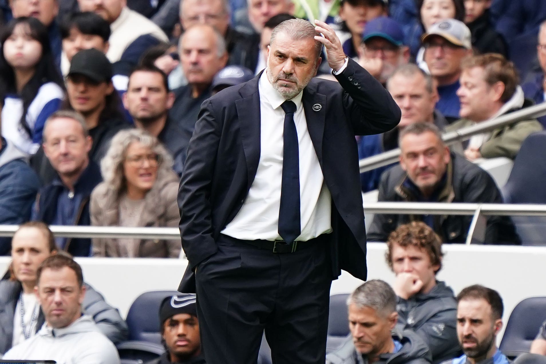 Tottenham manager Ange Postecoglou said the victory over West Ham was a reward for the fans (PA)