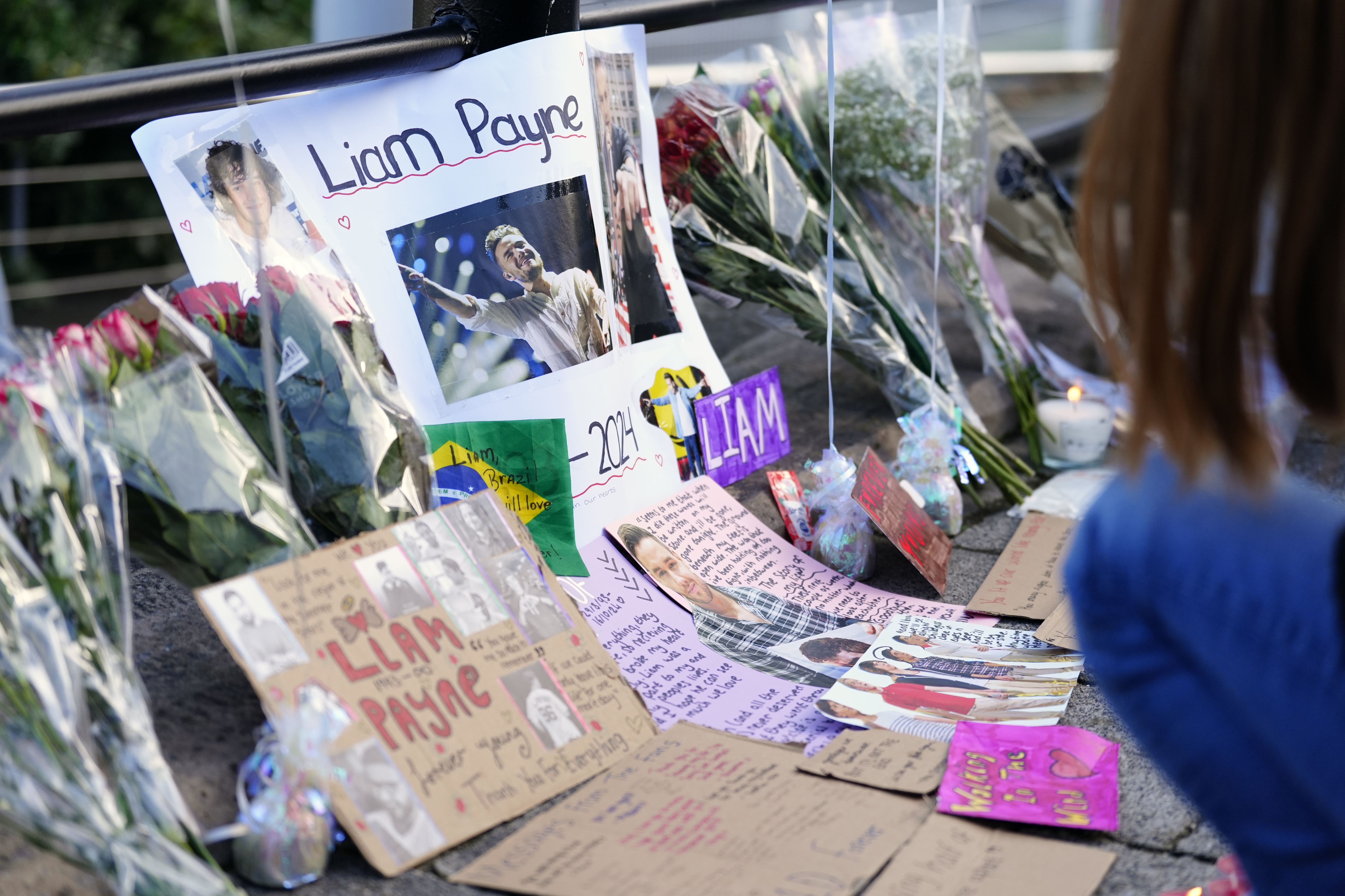 Tributes were left during the vigil (Peter Byrne/PA)