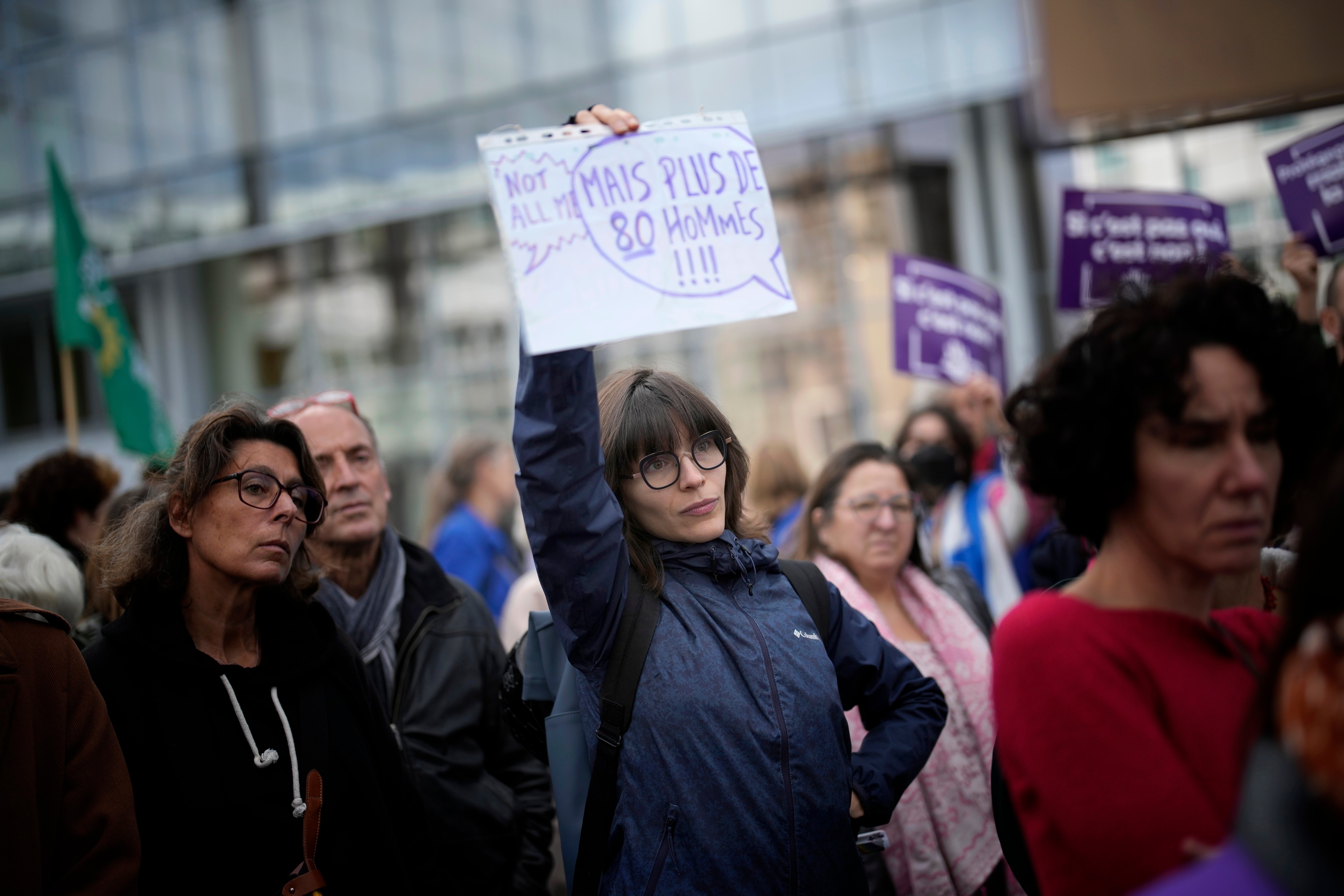 People gather to take part in a protest against sexual violence, in Paris, France, Saturday, Oct. 19