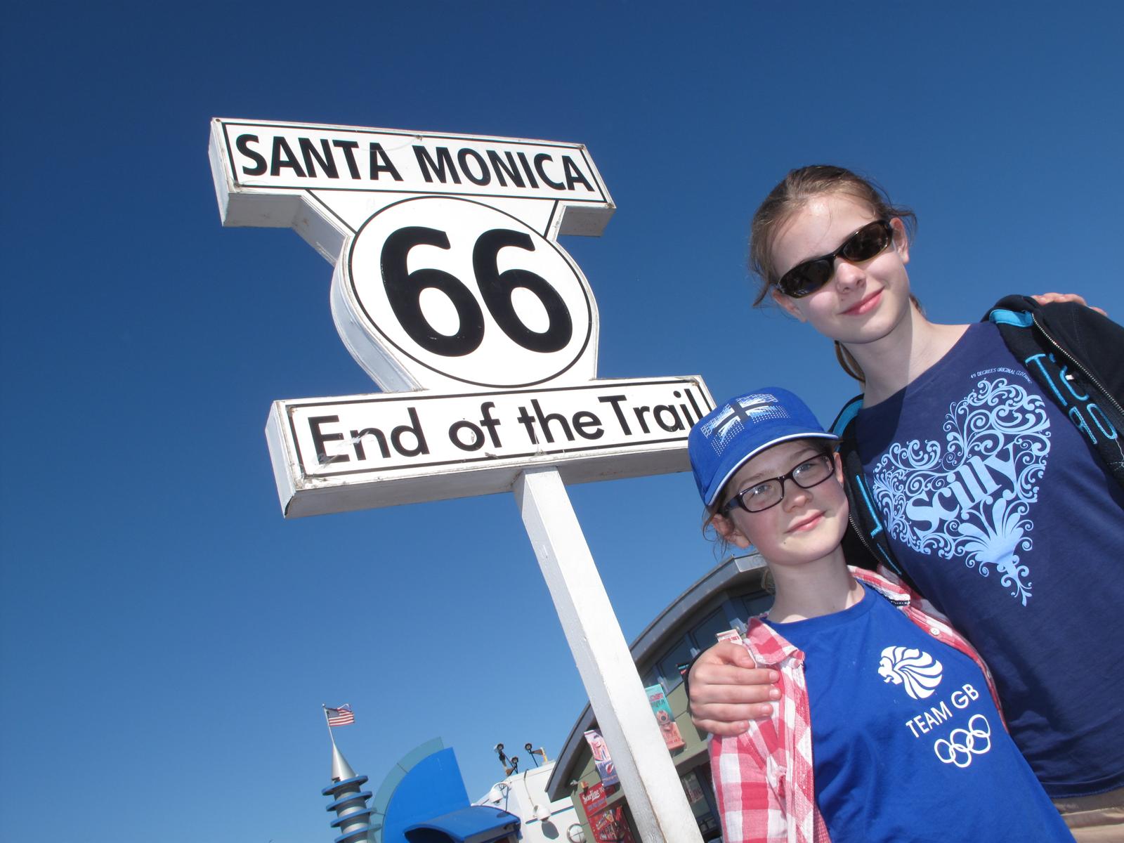 No through road: Poppy, left, and Daisy Calder at the end of Route 66 on the Californian coast