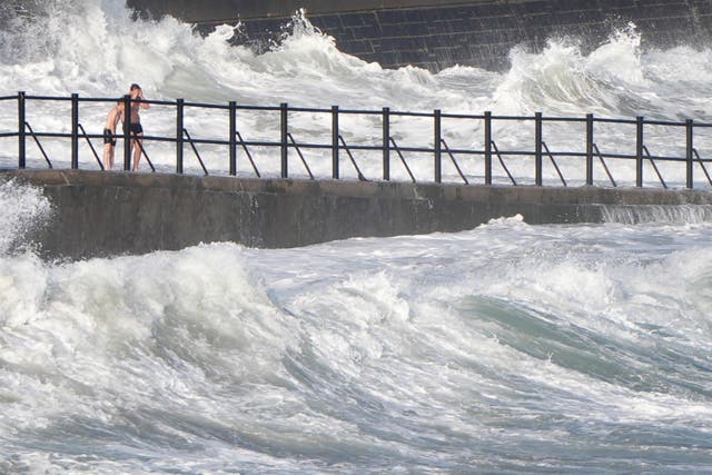 Warnings for strong winds and danger in coastal areas have been issued by the Met Office (PA)