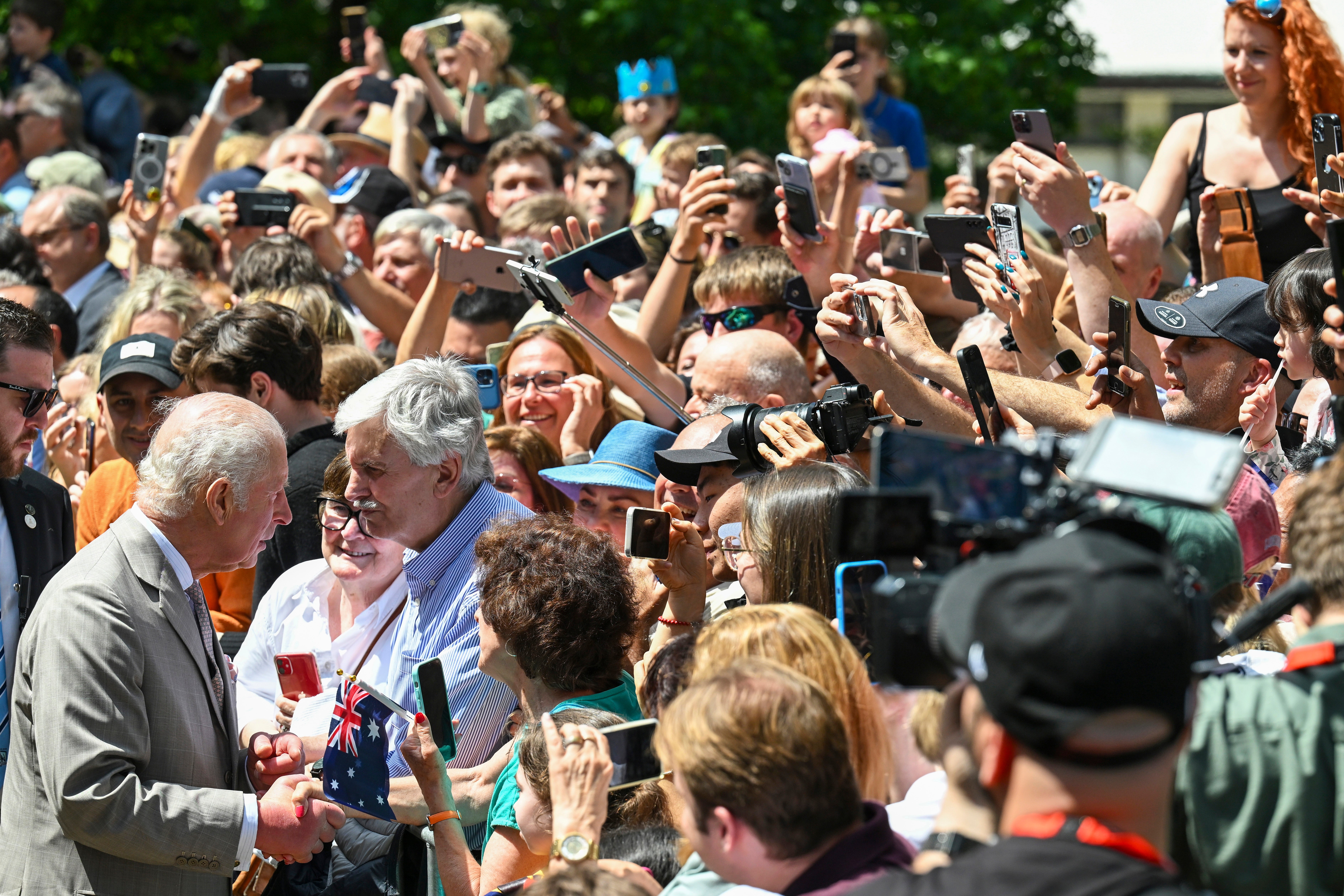 Charles greets well wishers as they leave St Thomas' Anglican Church in Sydney