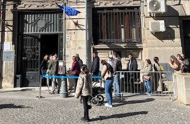 Voters lined up around the block in the Romanian capital, Bucharest, to take part in elections in neighbouring Moldova