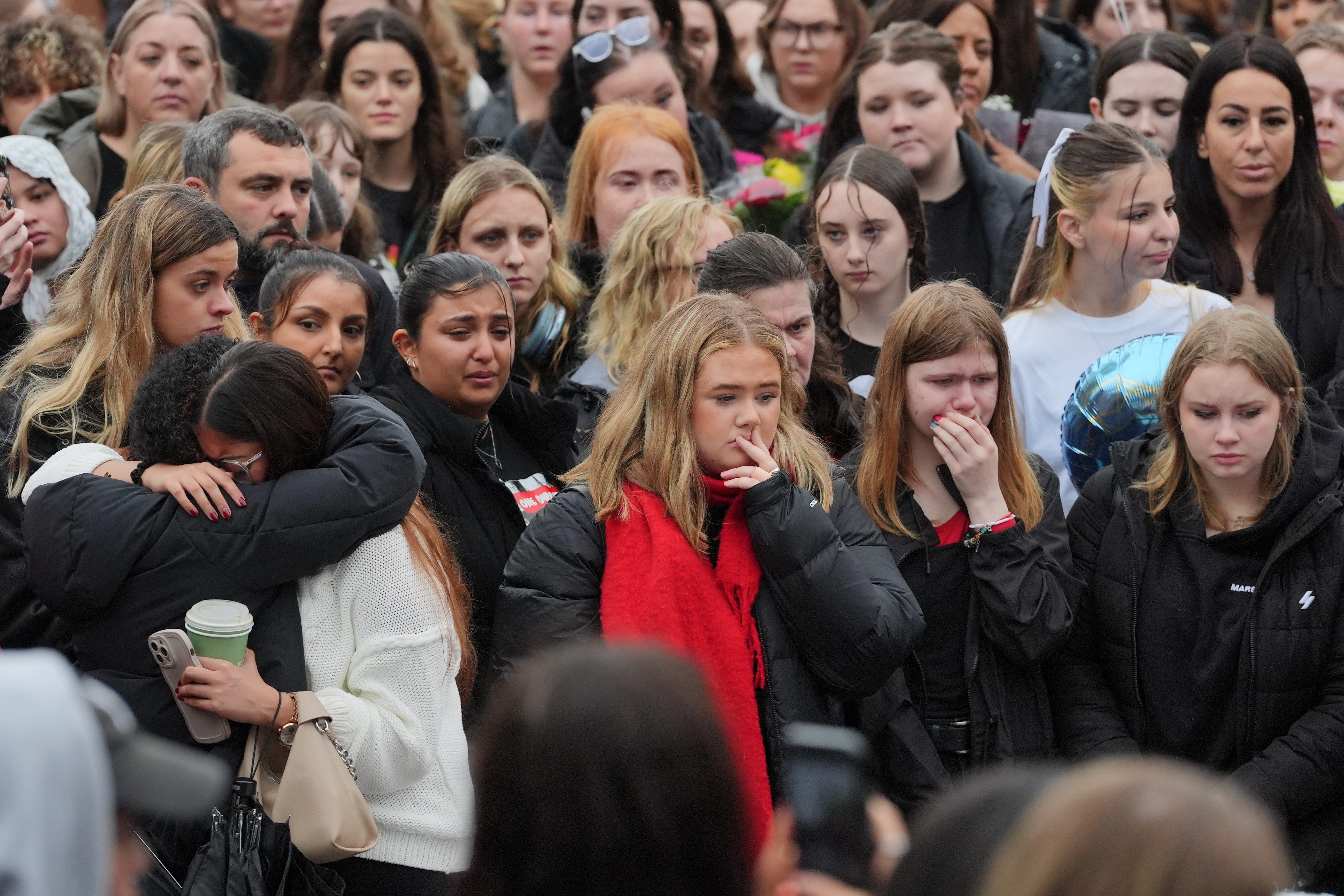 People attend a vigil for 31-year-old One Direction singer Liam Payne from Wolverhampton, at Hyde Park in central London. Payne, who rose to fame with the boy band on The X Factor, died after falling from a third floor balcony of the Casa Sur Hotel in the Argentine capital Buenos Aires on Wednesday. Picture date: Saturday October 19, 2024.