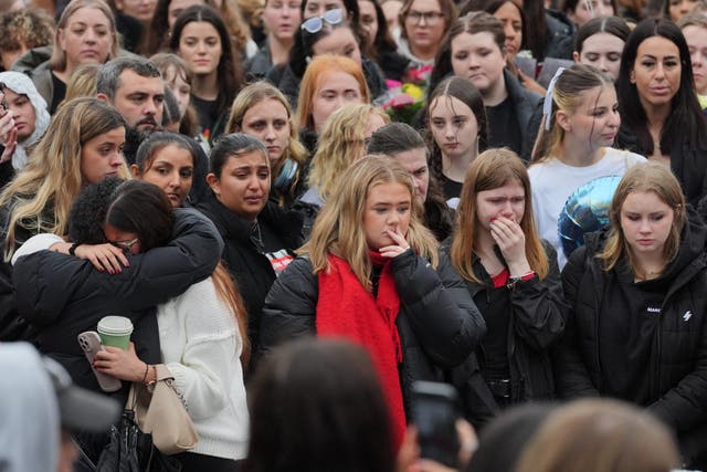 People attend a vigil for 31-year-old One Direction singer Liam Payne from Wolverhampton, at Hyde Park in central London. Payne, who rose to fame with the boy band on The X Factor, died after falling from a third floor balcony of the Casa Sur Hotel in the Argentine capital Buenos Aires on Wednesday. Picture date: Saturday October 19, 2024.