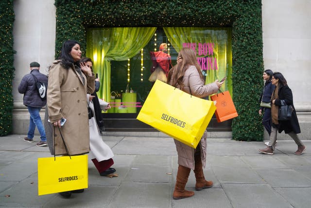 Shoppers on Oxford Street in London (Lucy North/PA)