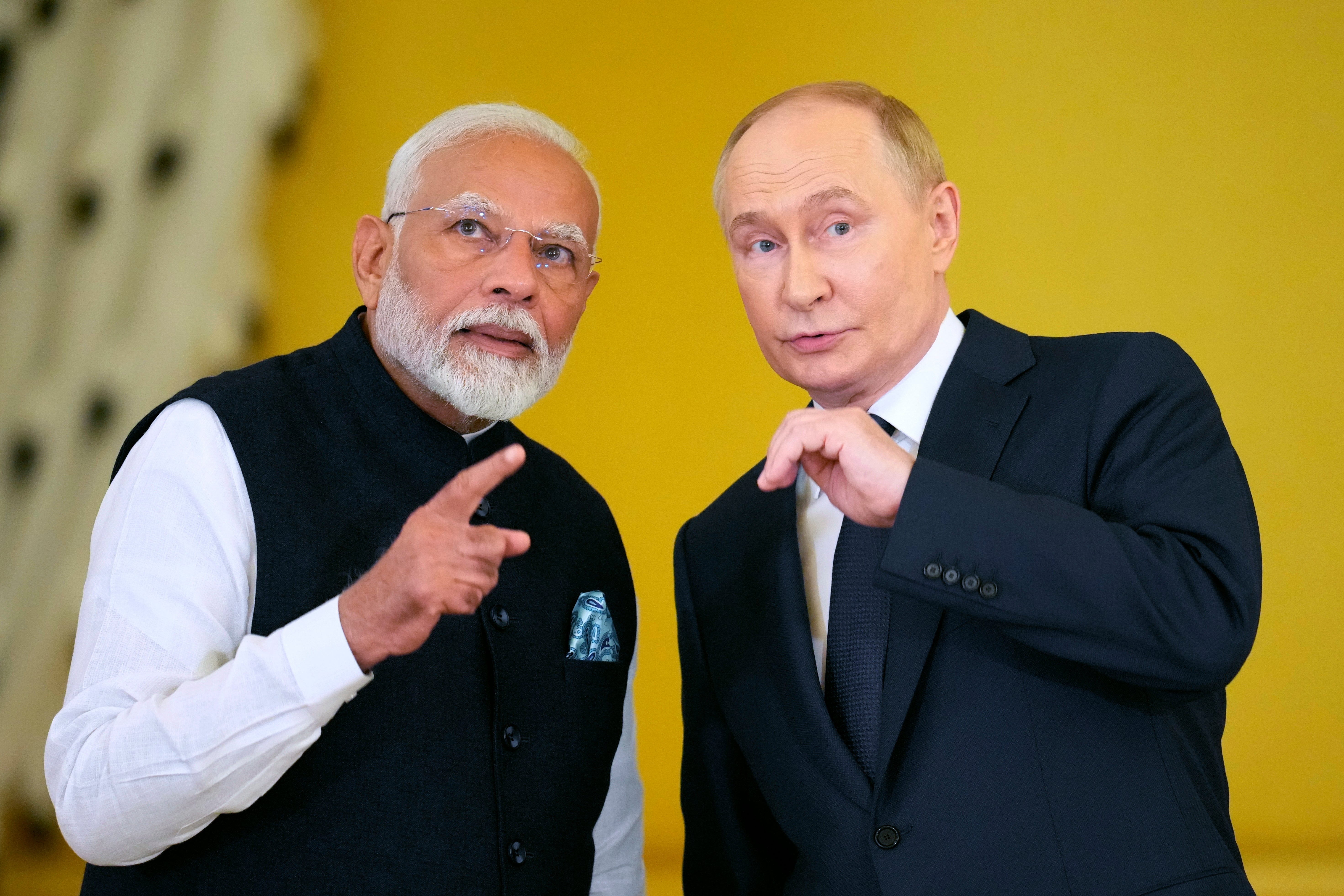 Russian President Vladimir Putin, right, and Indian Prime Minister Narendra Modi