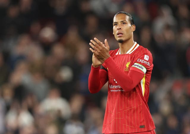 <p>Liverpool captain Virgil van Dijk applauds fans at full-time</p>