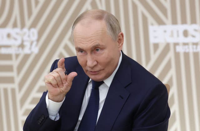 <p>Vladimir Putin speaks with heads of media platforms from Brics countries in Moscow, Russia, on 18 October 2024  </p>