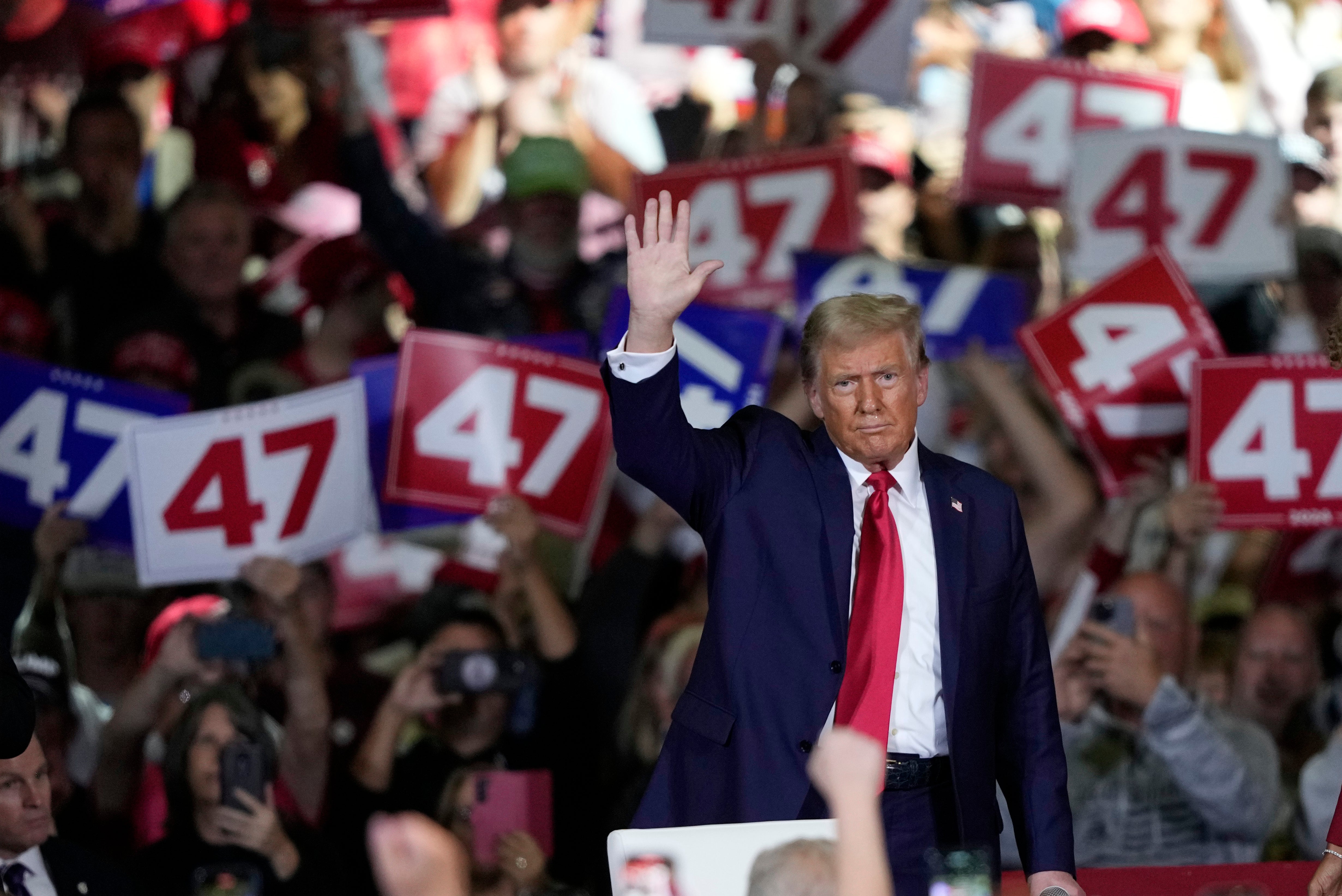 Republican presidential nominee former President Donald Trump waves during a town hall in Lancaster, Pennsylvania. A new poll shows a number of Republicans believe he should do “whatever it takes” for him to get to the White House