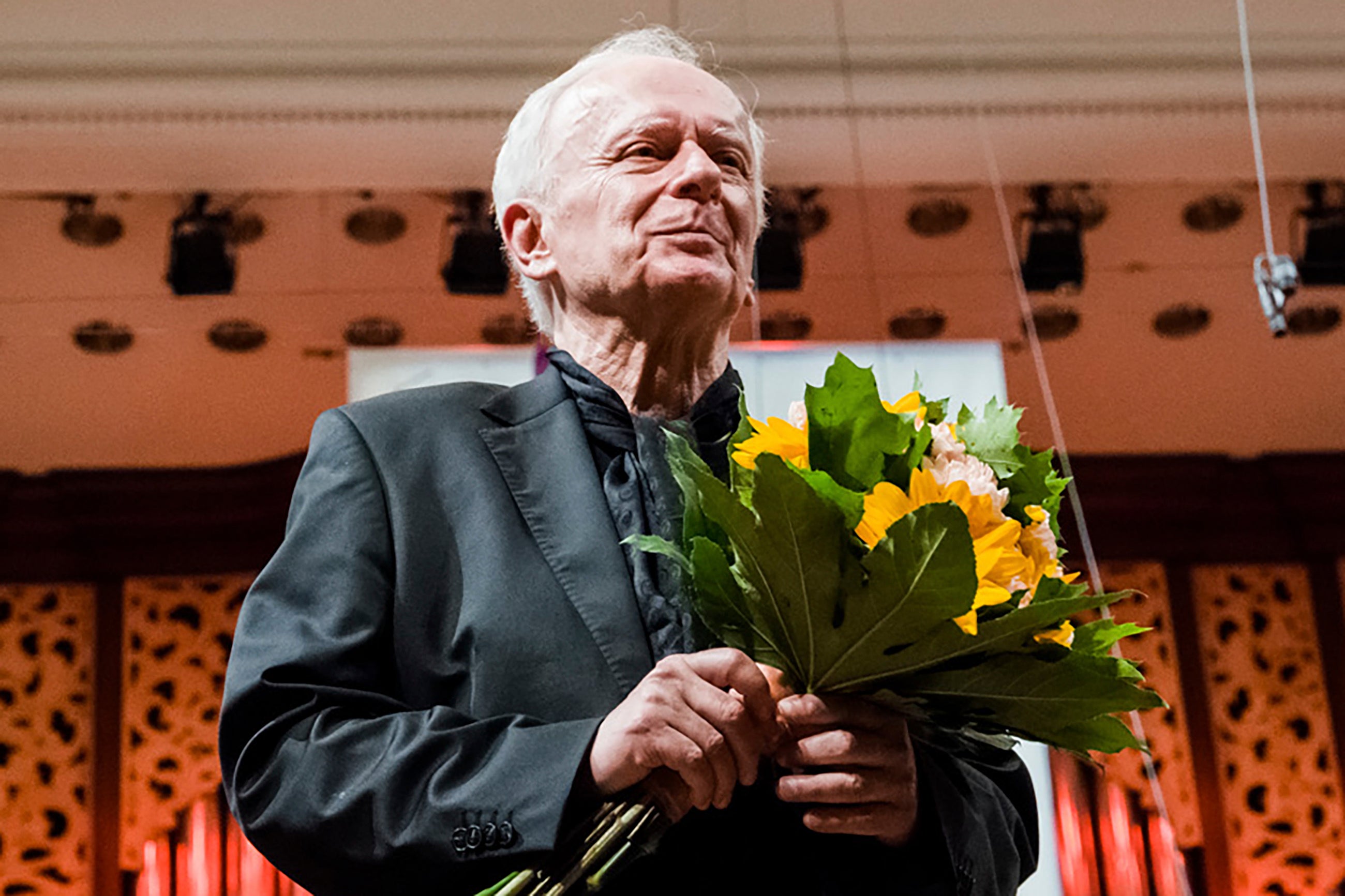 Polish pianist Janusz Olejniczak, who played the piano parts in the 2002 Oscar-winning movie The Pianist, receives applause from the audience following a concert at the Warsaw Philharmonic on 5 Jan 2020