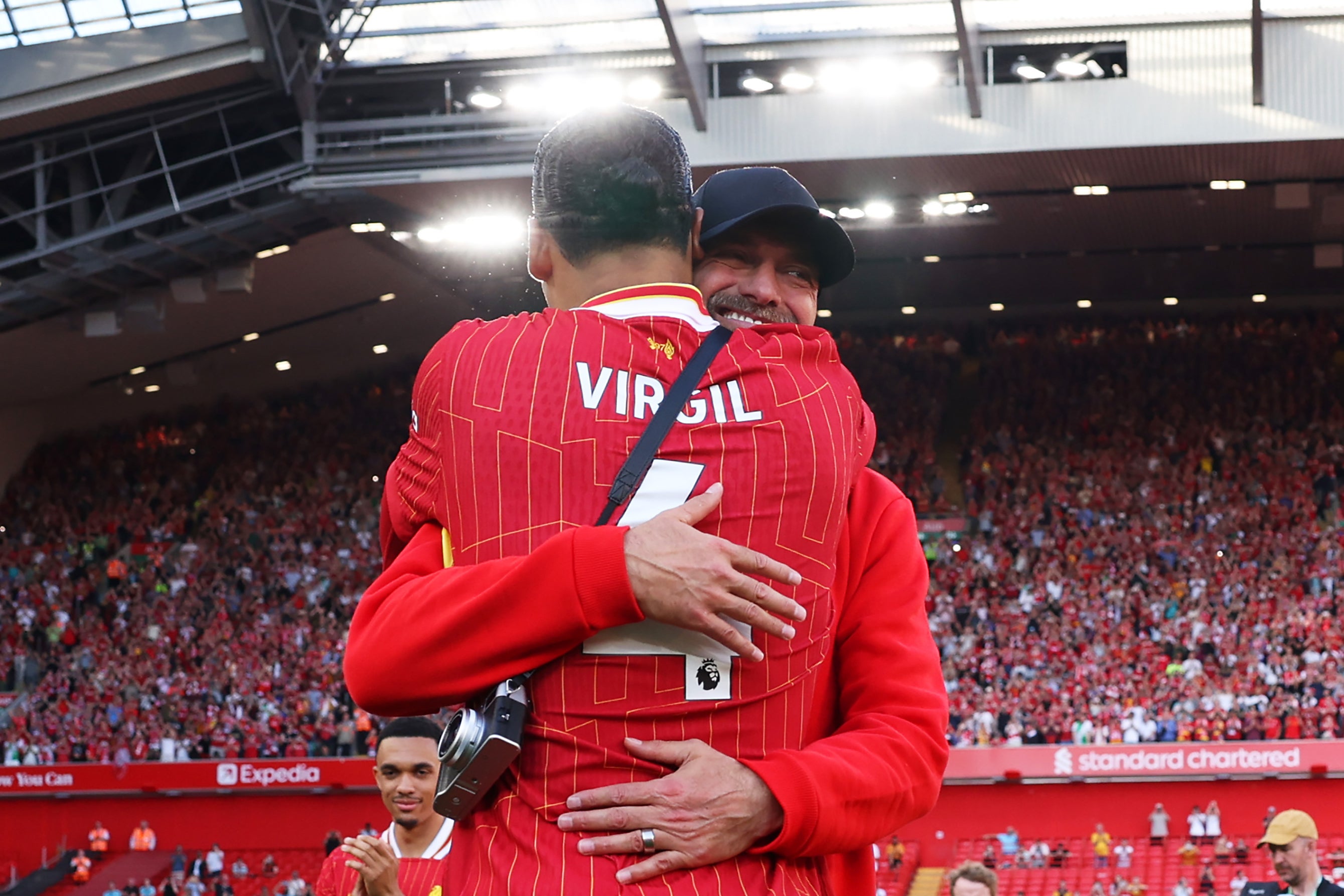 Jurgen Klopp hugs Virgil van Dijk after his final game in charge of Liverpool