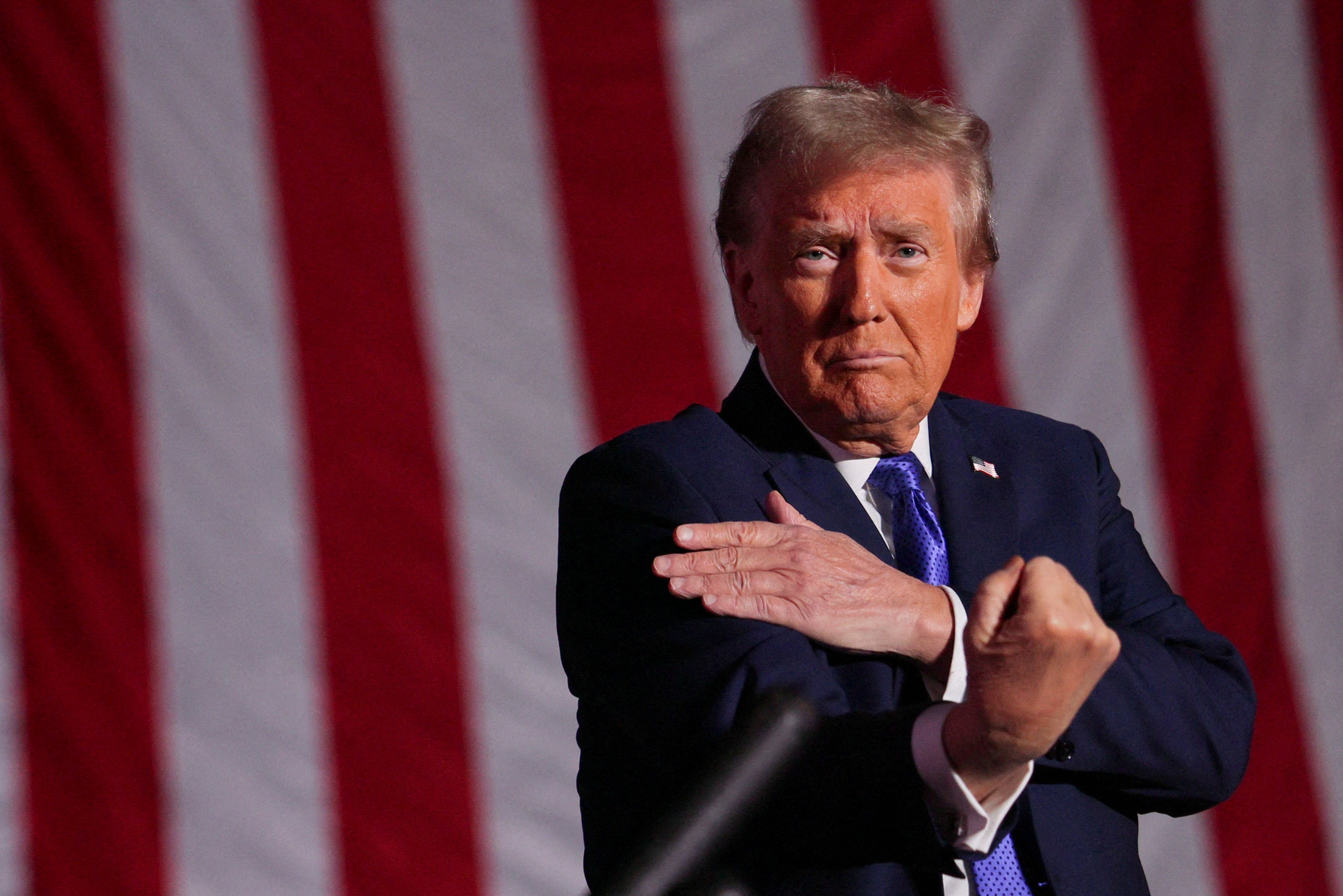 Trump gestures at the end of his Make America Great Again Rally in Latrobe, Pennsylvania, on October 19