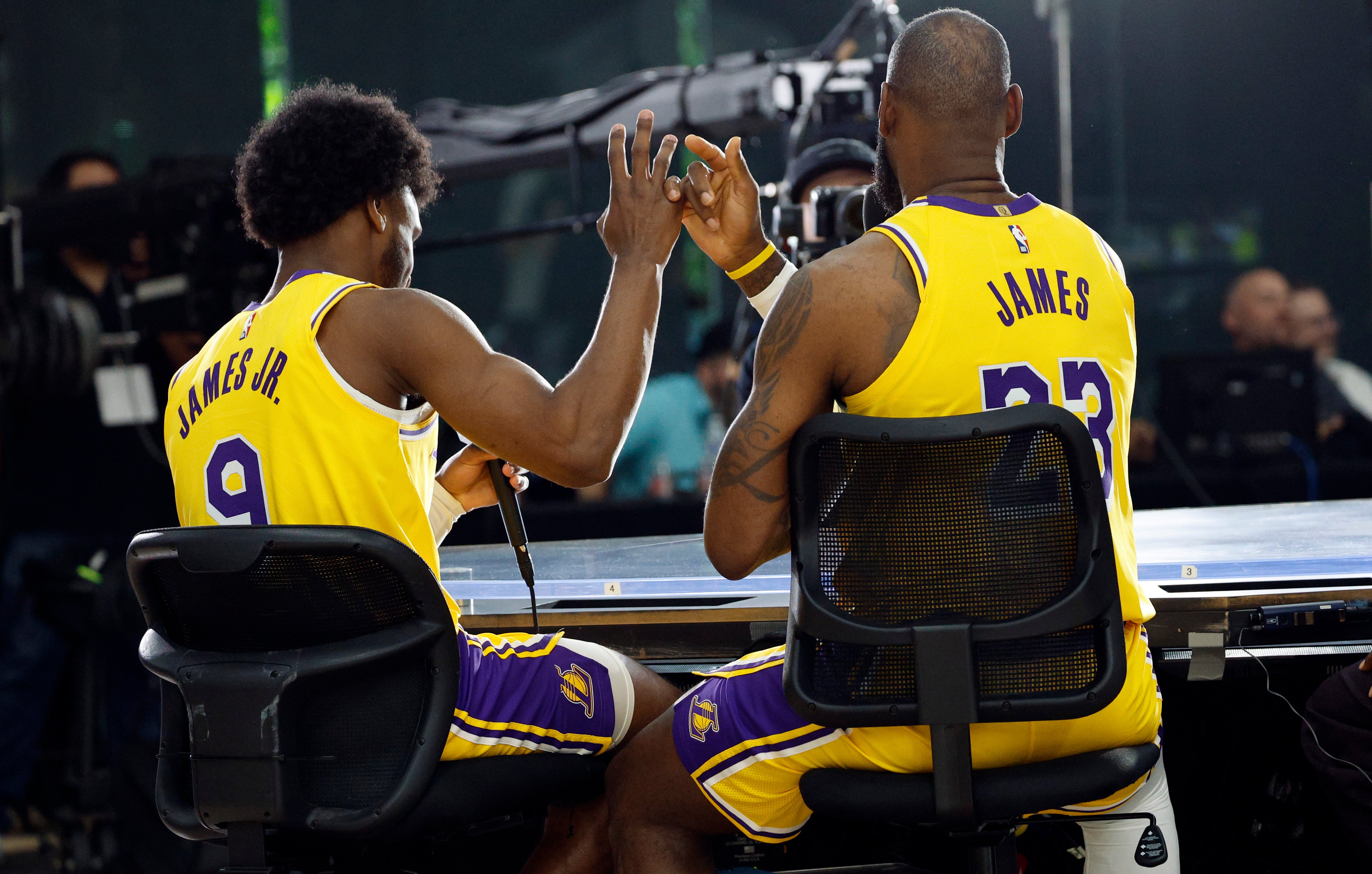 Bronny and LeBron attend the Lakers media day at UCLA Health Training Centre on 30 September 2024 in El Segundo, California