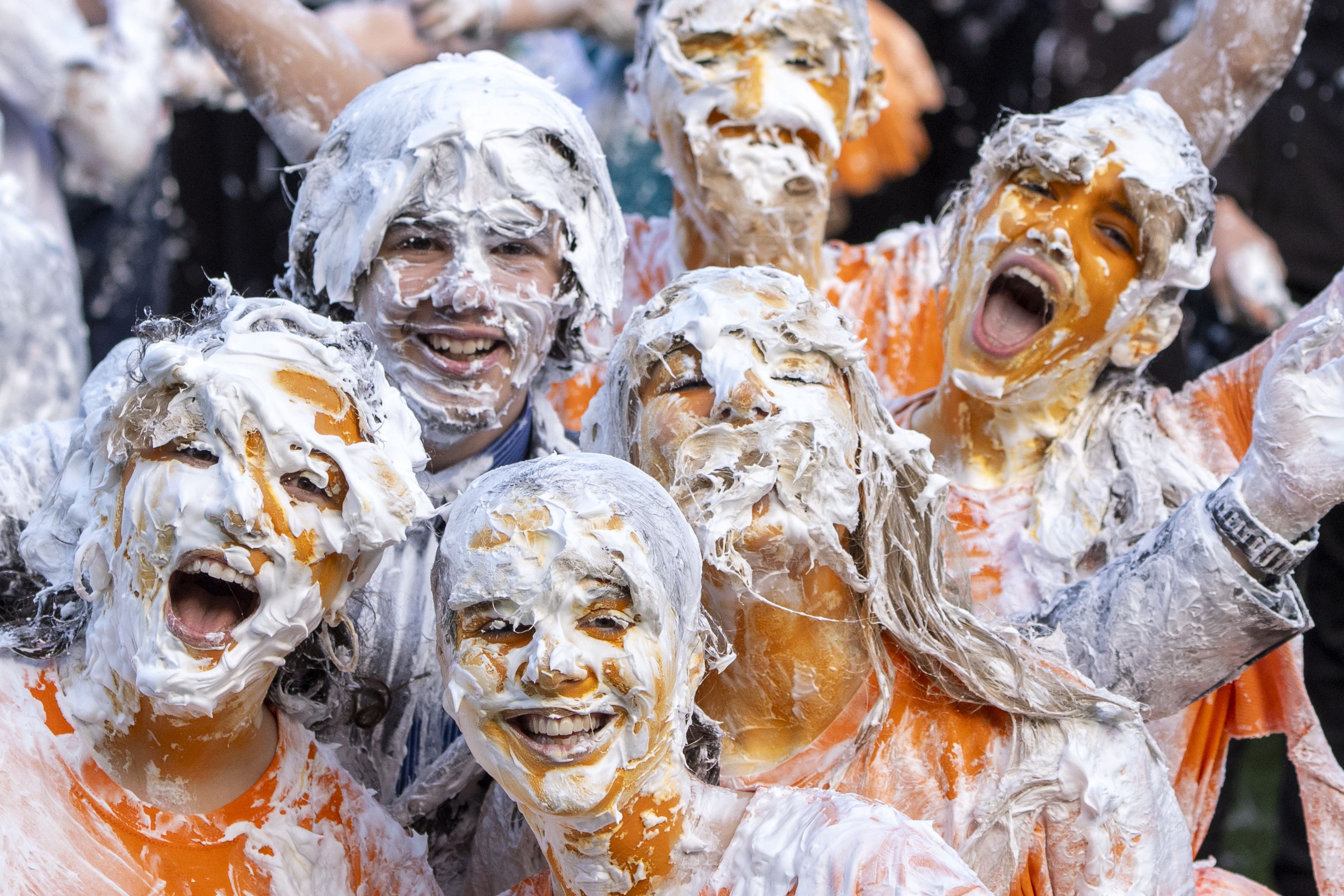 Students enjoying the traditional Raisin Monday foam fight at the University of St Andrews (Jane Barlow/PA)