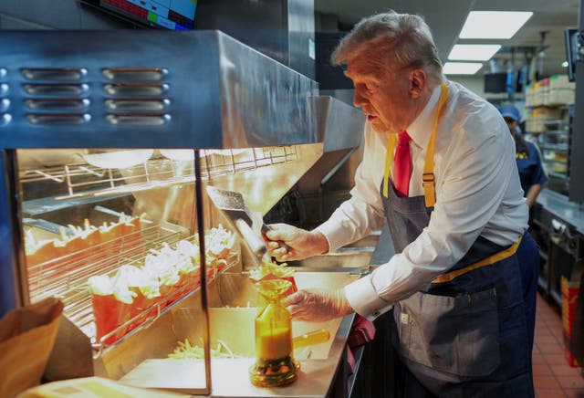 <p>Trump works the fryer at a McDonald’s in Bucks County, Pennsylvania for a campaign stunt </p>