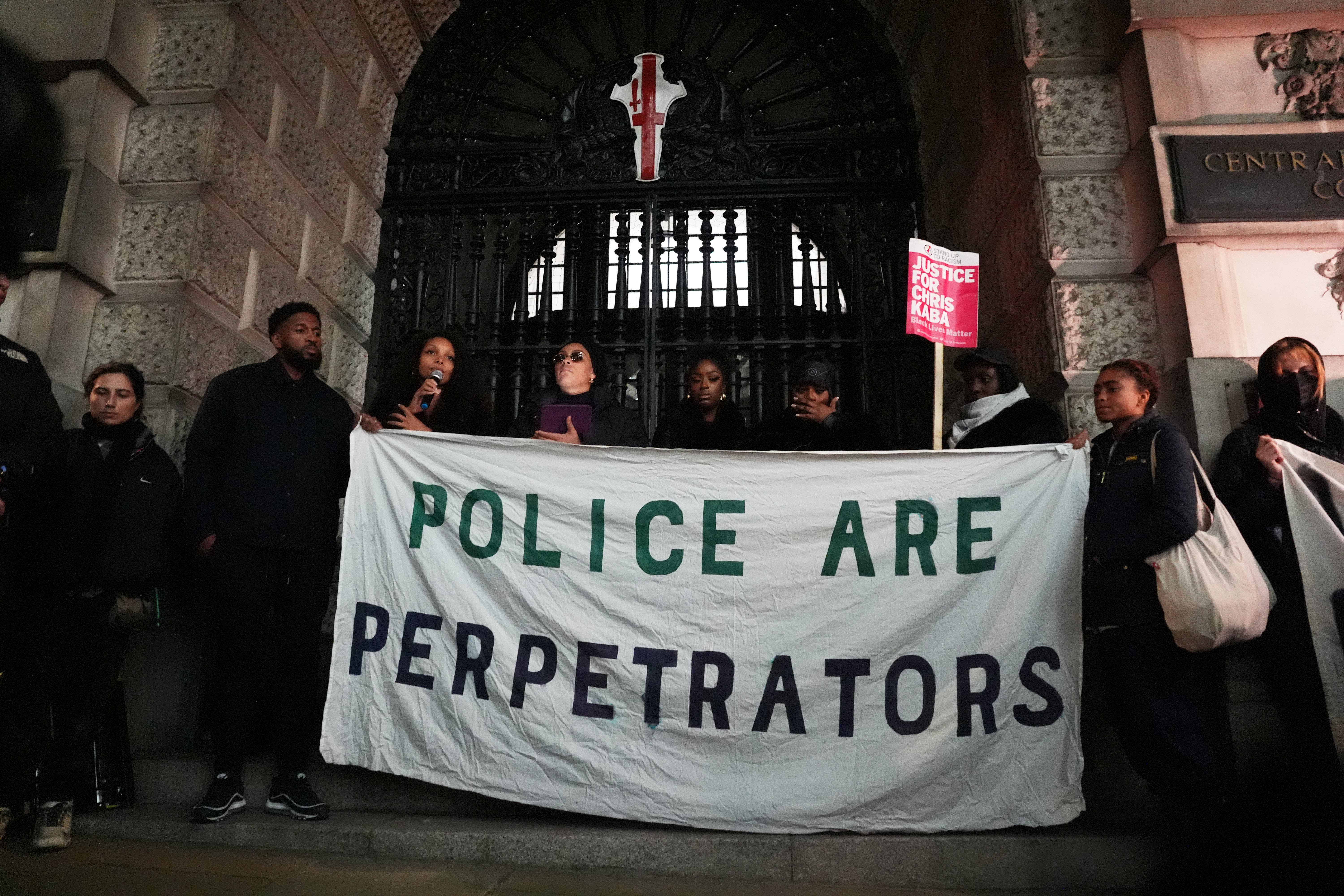 Friends and family of Chris Kaba demonstrate outside the Old Bailey after a police marksman who fatally shot Mr Kaba has been cleared of his murder (Jordan Pettitt/PA)