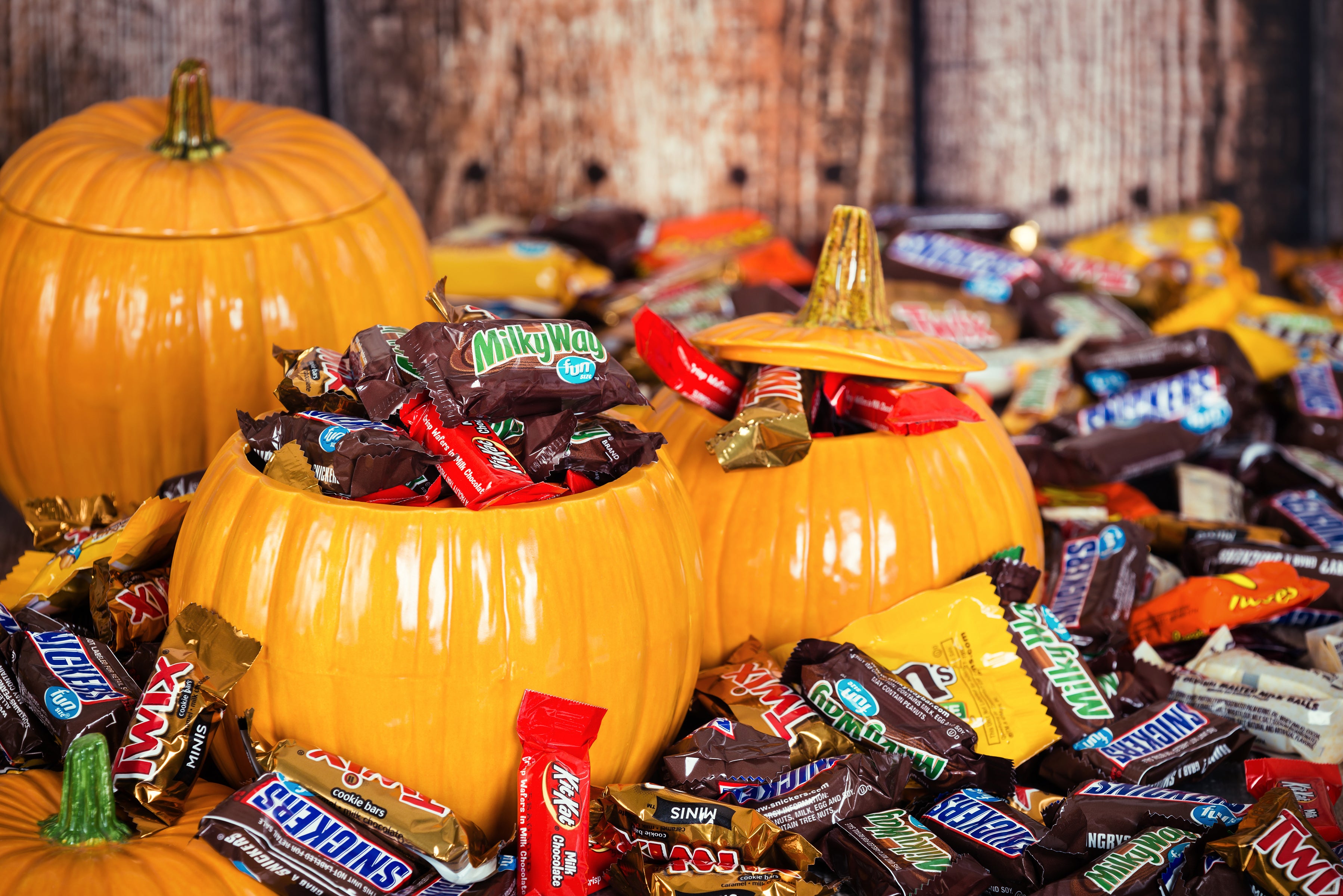 Decorative ceramic pumpkins are filled with assorted Halloween chocolate candy. There could be less chocolate candy in stores this year because of the cocoa shortage