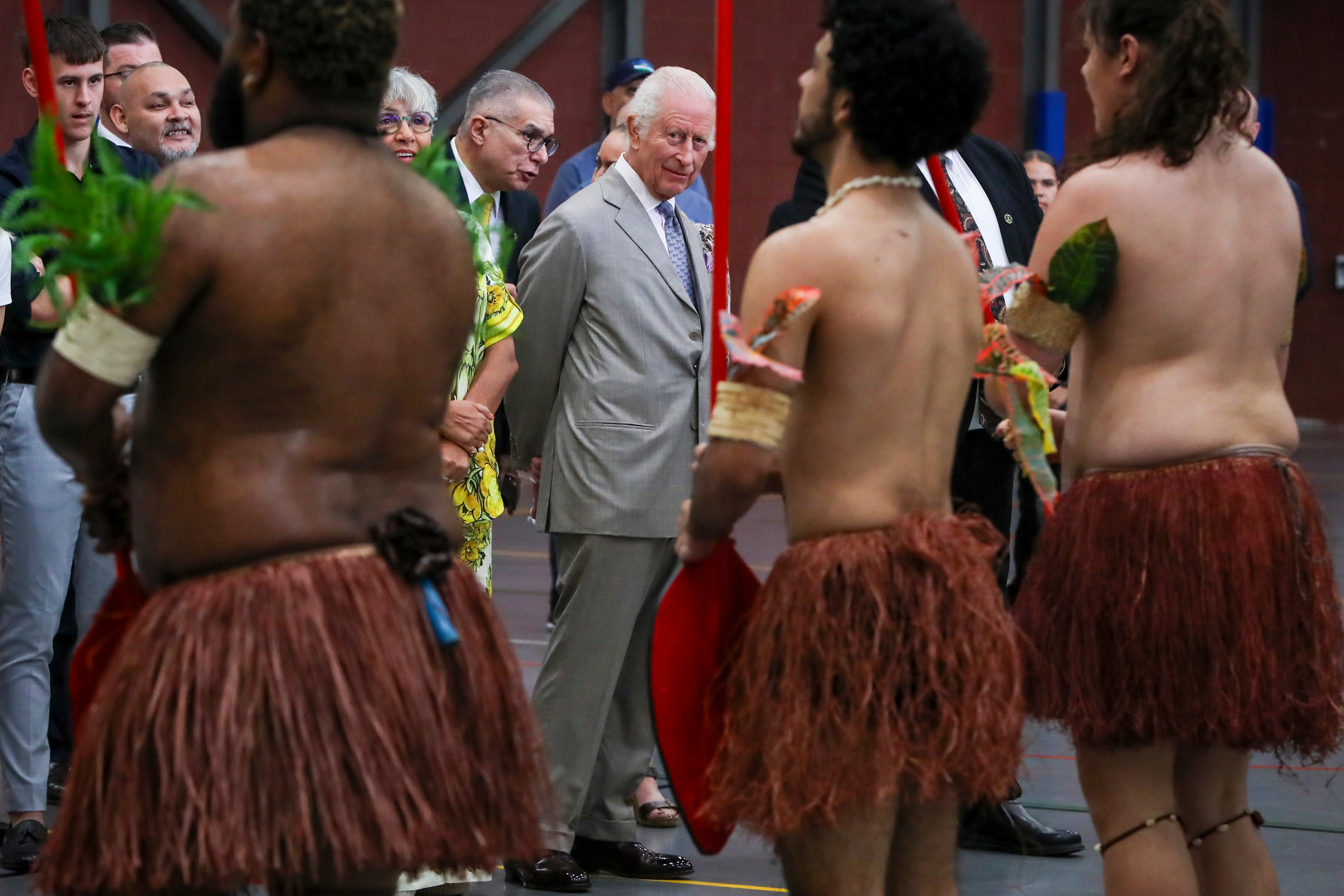 King Charles watches a performance by the Mui Mui Bumer Gedlam group during a visit to the National Centre of Indigenous Excellence in Sydney, Australia, on Tuesday