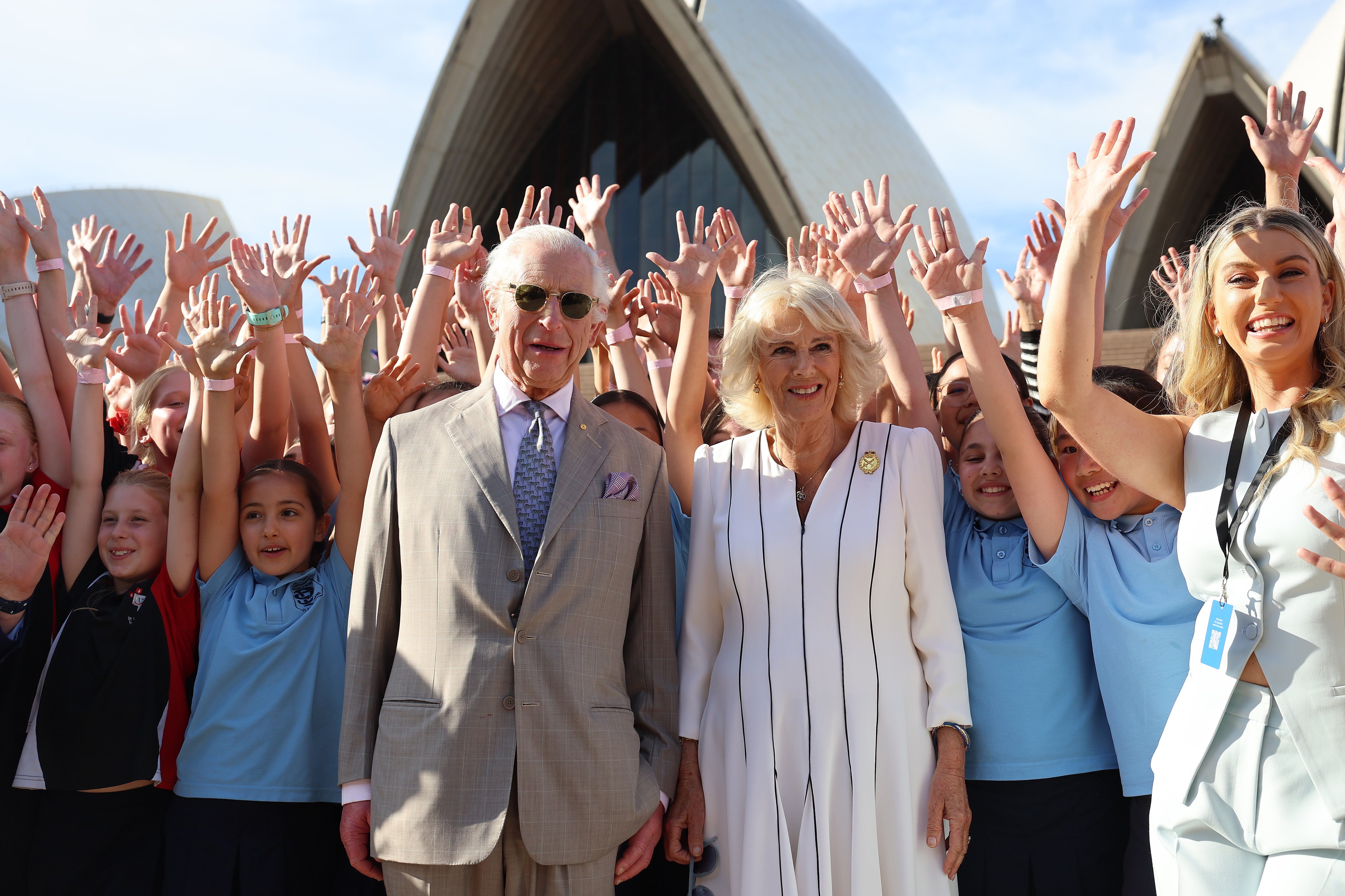 King Charles III and Queen Camilla posed for a photo with schoolchildren at the Sydney Opera House.