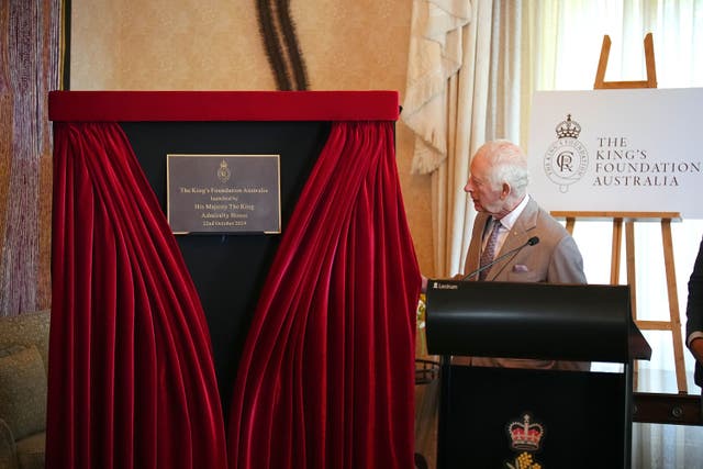 The King unveils a plaque at the launch of The King’s Foundation Australia at Admiralty House in Sydney during his royal tour (Aaron Chown/PA)