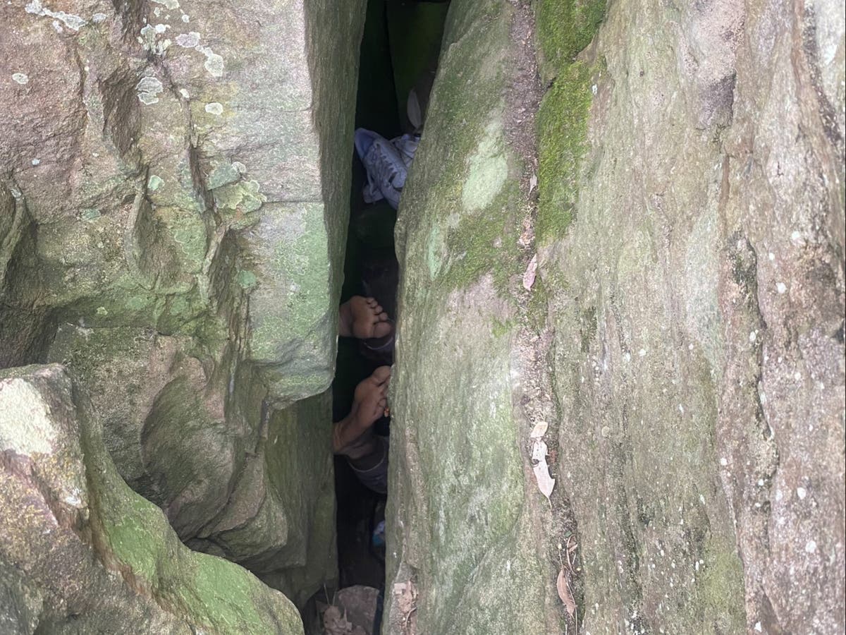 Woman stuck upside down in crevice for 7 hours while trying to retrieve phone