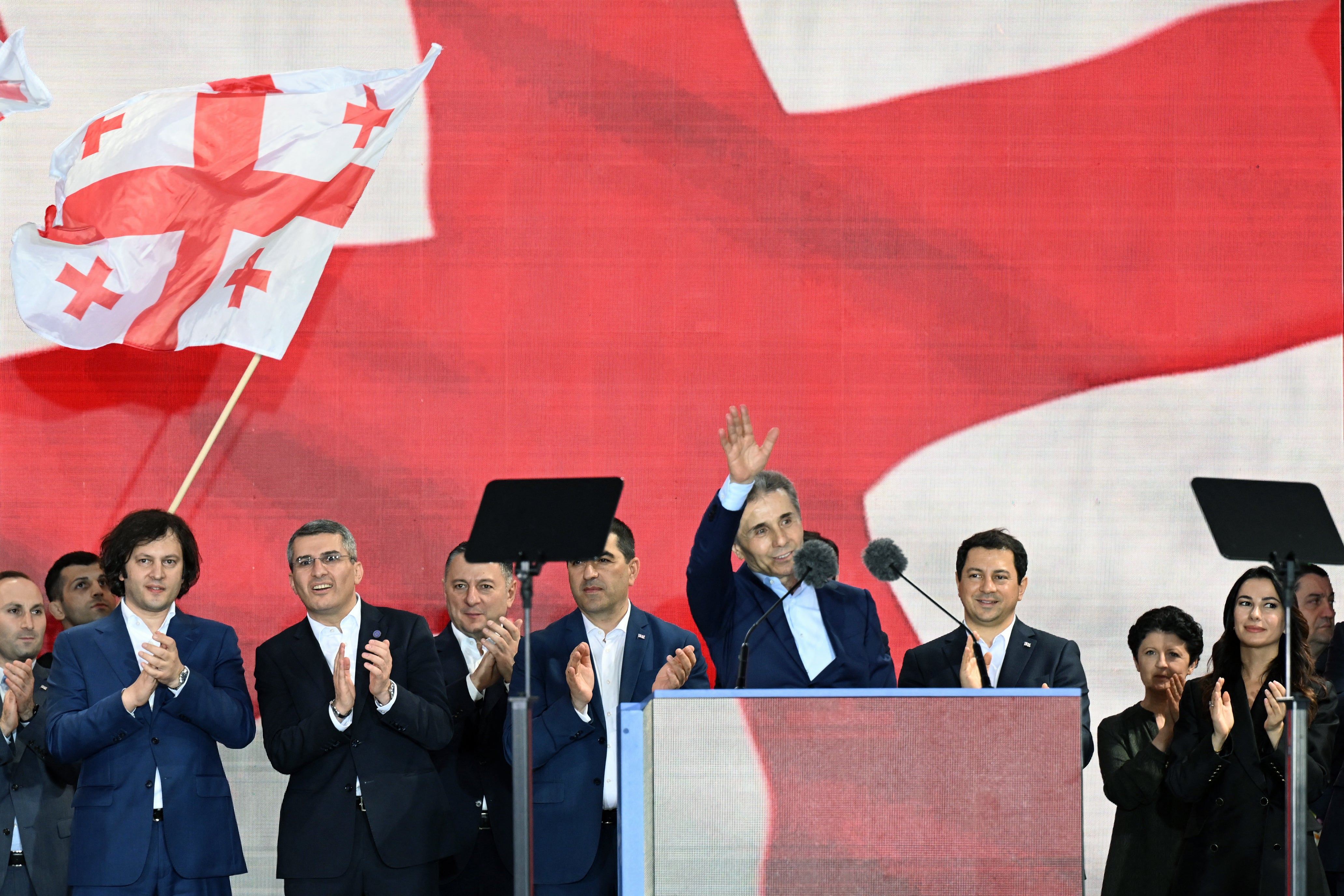 Ivanishvili waves to the crowd during a rally organised by the ruling Georgian Dream party aimed at countering days of mass anti-government protests over a controversial ‘foreign influence’ bill