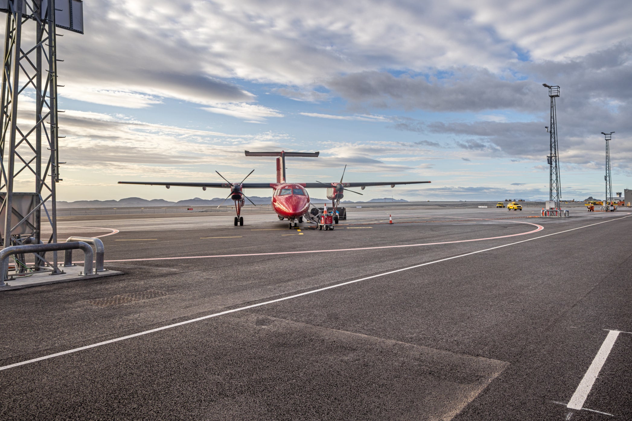 A Dash 8 airplane from Air Greenland on the tarmac of new runway in Nuuk, Greenland