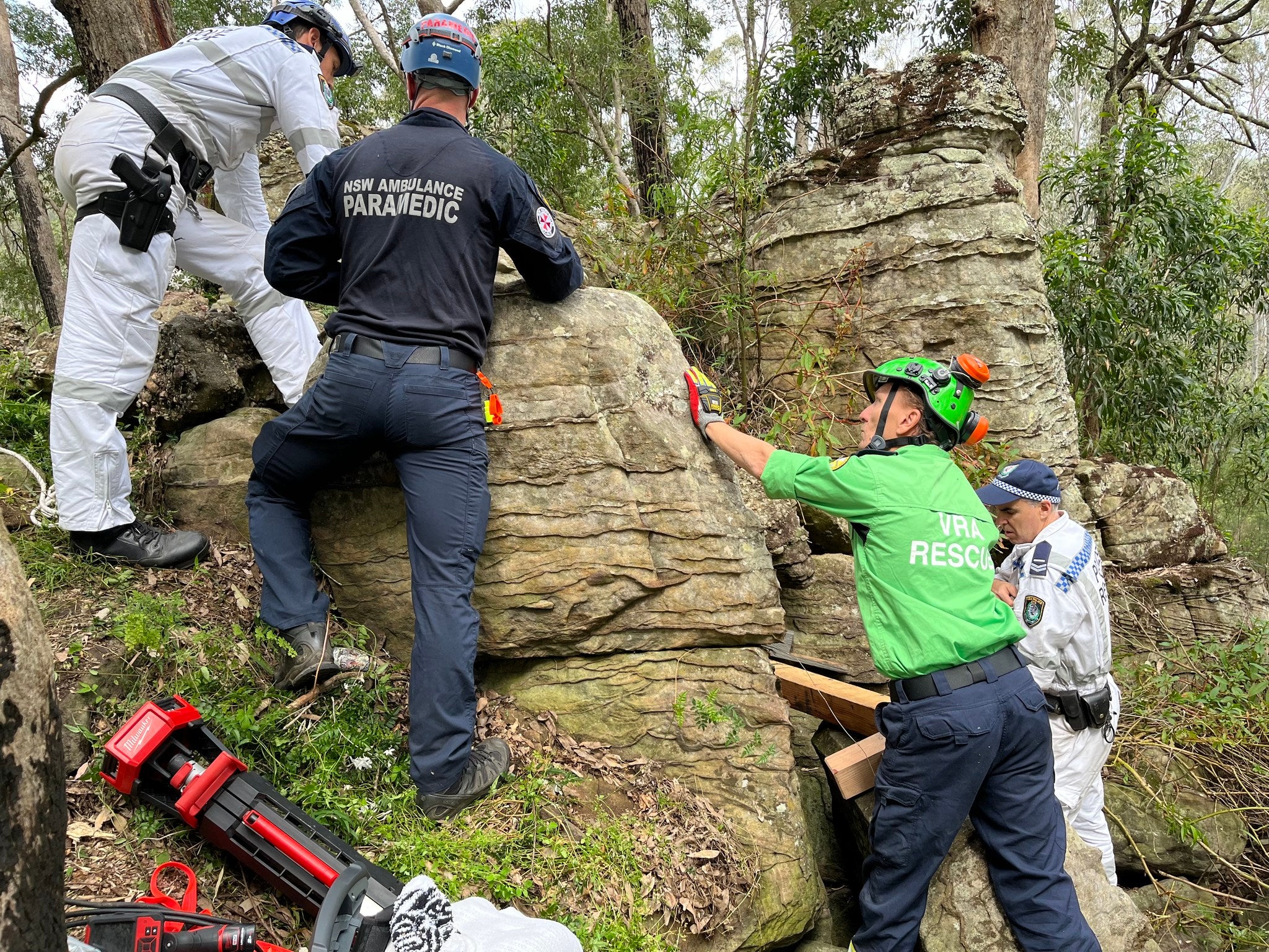 It took seven hours for emergency services to extract her from the boulders