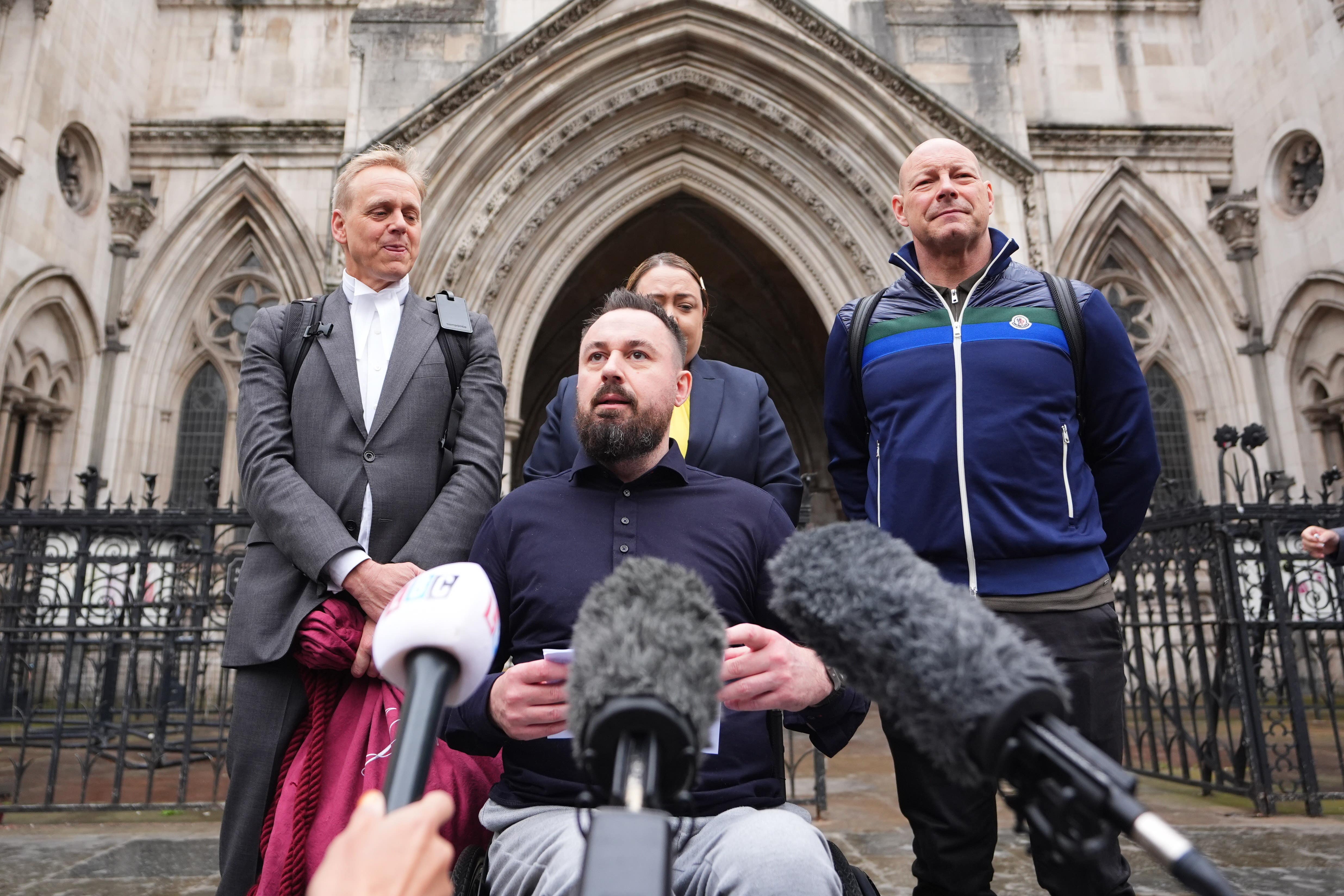 Martin Hibbert (centre), who was injured in the May 2017 Manchester Arena bombing