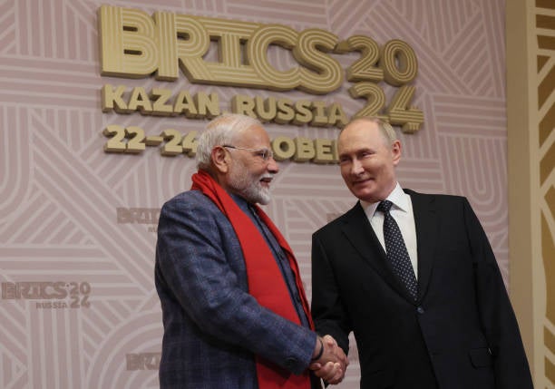 Vladimir Putin greets Narendra Modi during a welcoming ceremonial  for participants of the Brics acme  successful  Kazan, Russia, 22 October 2024