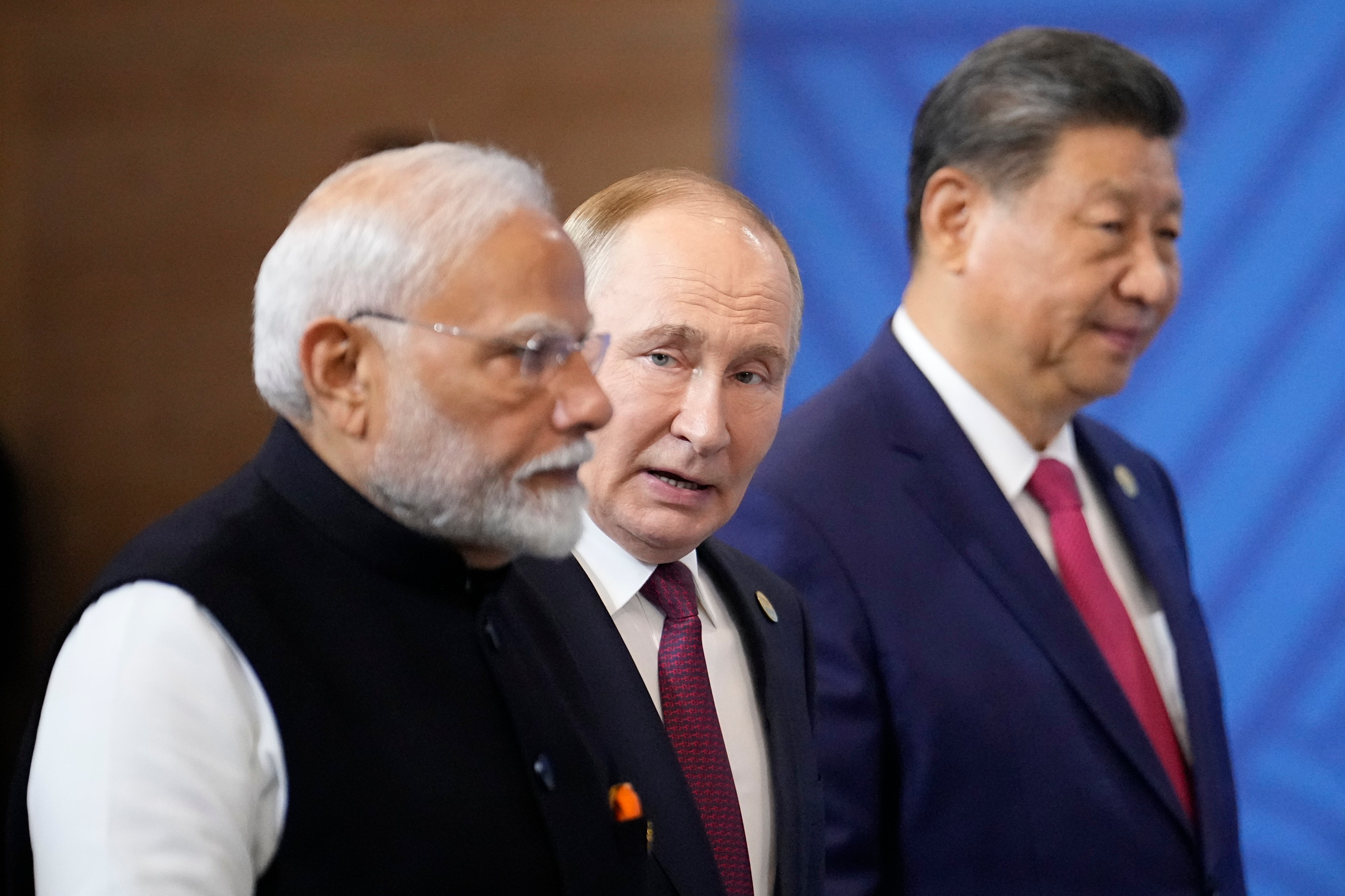 Narendra Modi, Vladimir Putin and Xi Jinping be  a photograph  ceremonial  connected  the sidelines of the Brics summit