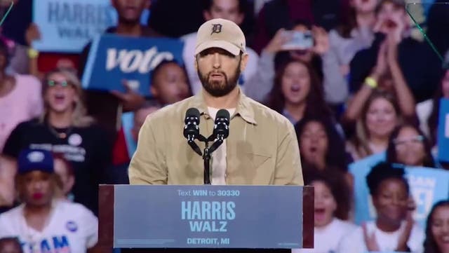 <p>Eminem makes three-word plea at Detroit rally.</p>