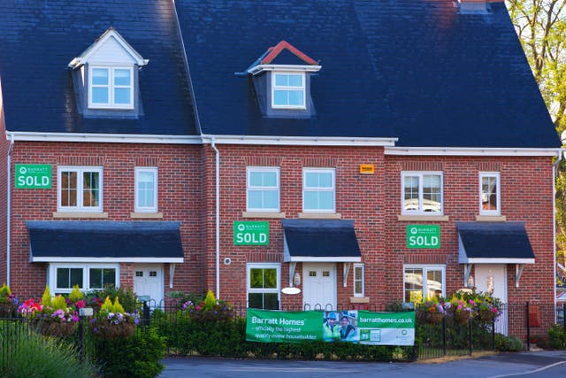 Barratt Redrow said it is moving ahead with plans to shut nine offices and to save costs (PA)