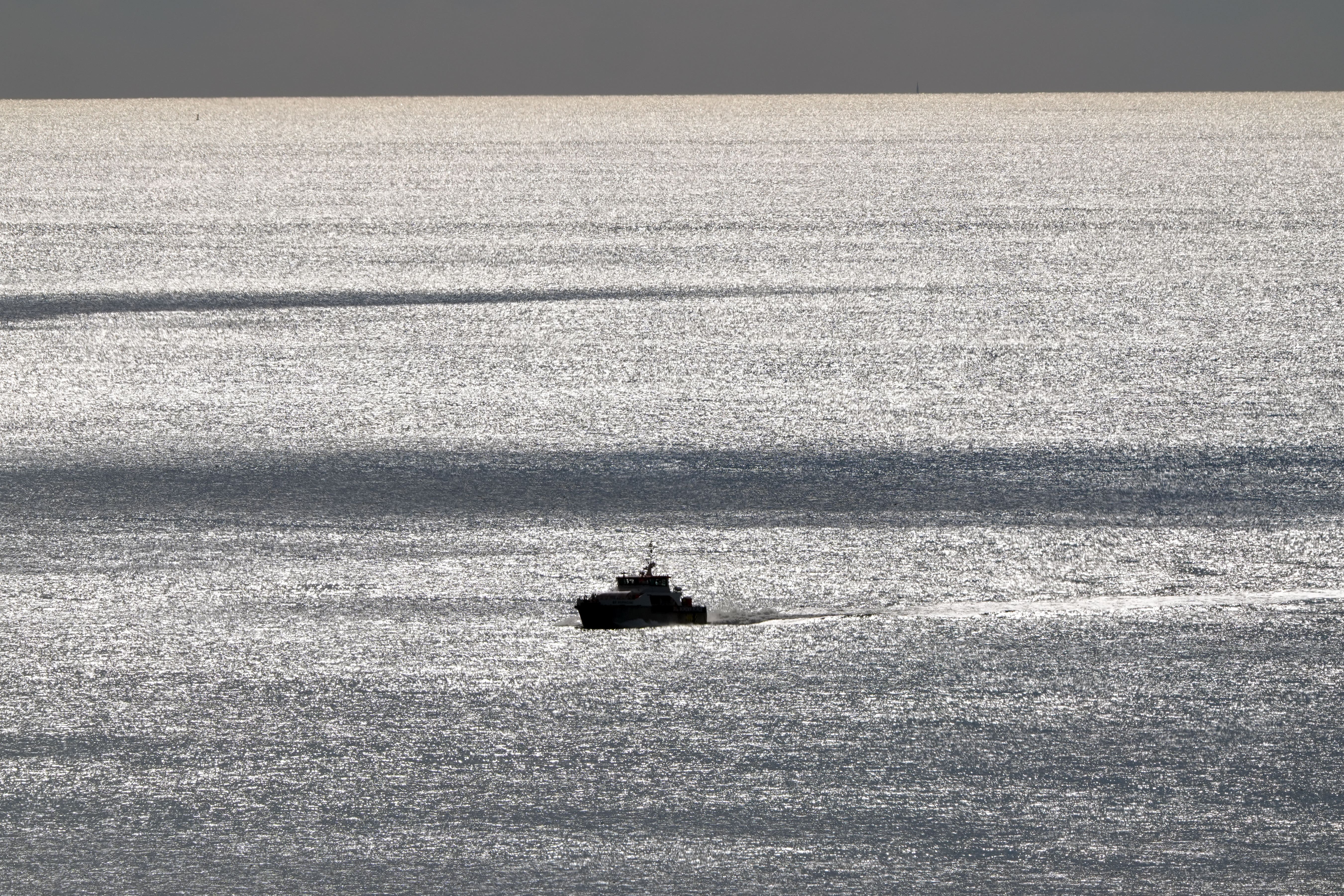A group of people thought to be migrants are brought in to Dover, Kent, onboard a Border Force vessel following a small boat incident in the Channel earlier in October (Gareth Fuller/PA)