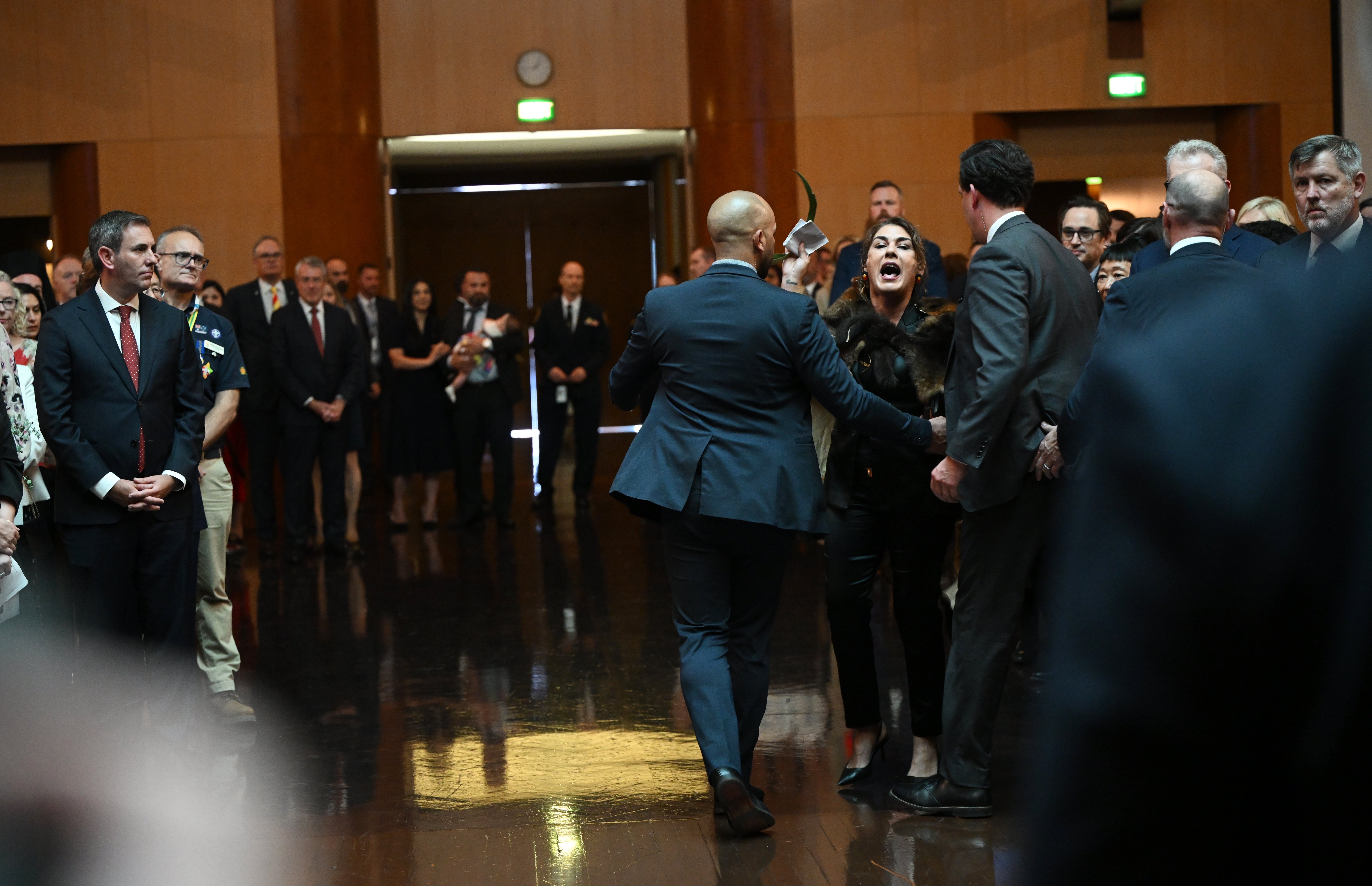 Australian senator Lidia Thorpe protests during the ceremonial welcome to Australia for King Charles and Queen Camilla at Australian Parliament House in Canberra (Victoria Jones/PA)