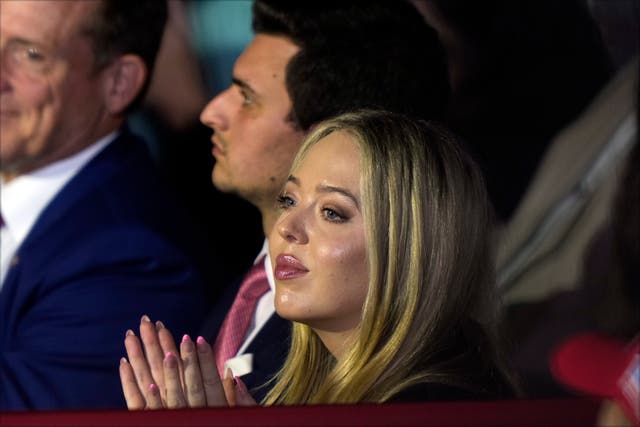 <p>Tiffany Trump watches as father Donald speaks at a campaign rally at Mignes Coliseum, Greenville, on Monday</p>