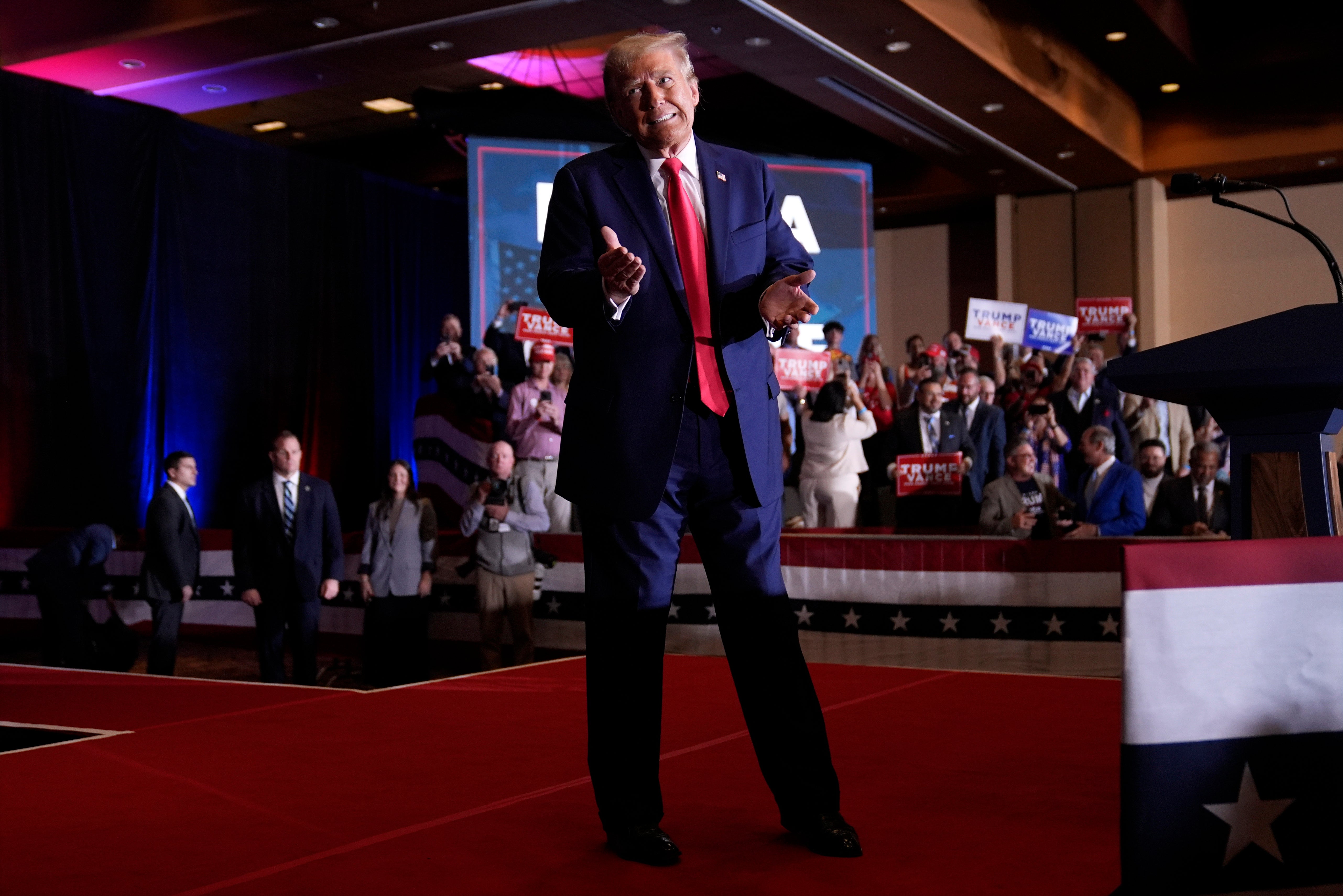 Trump reacts after speaking at a faith event at the Concord Convention Center, Monday, where he boasted about Tiffany’s academic prowess