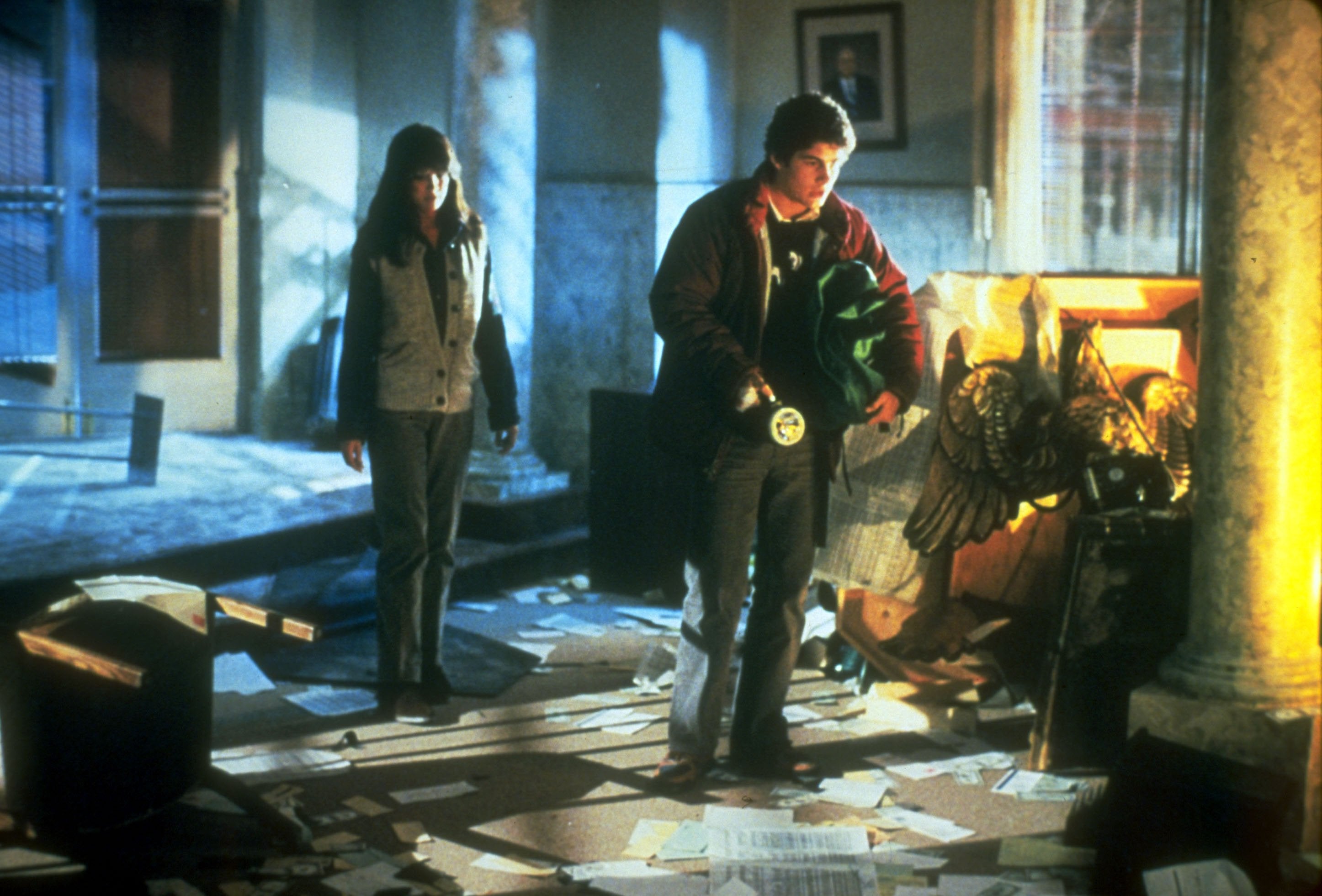 Gone gremlin hunting: Kate Beringer, played by Phoebe Cates, searches a trashed room with Billy