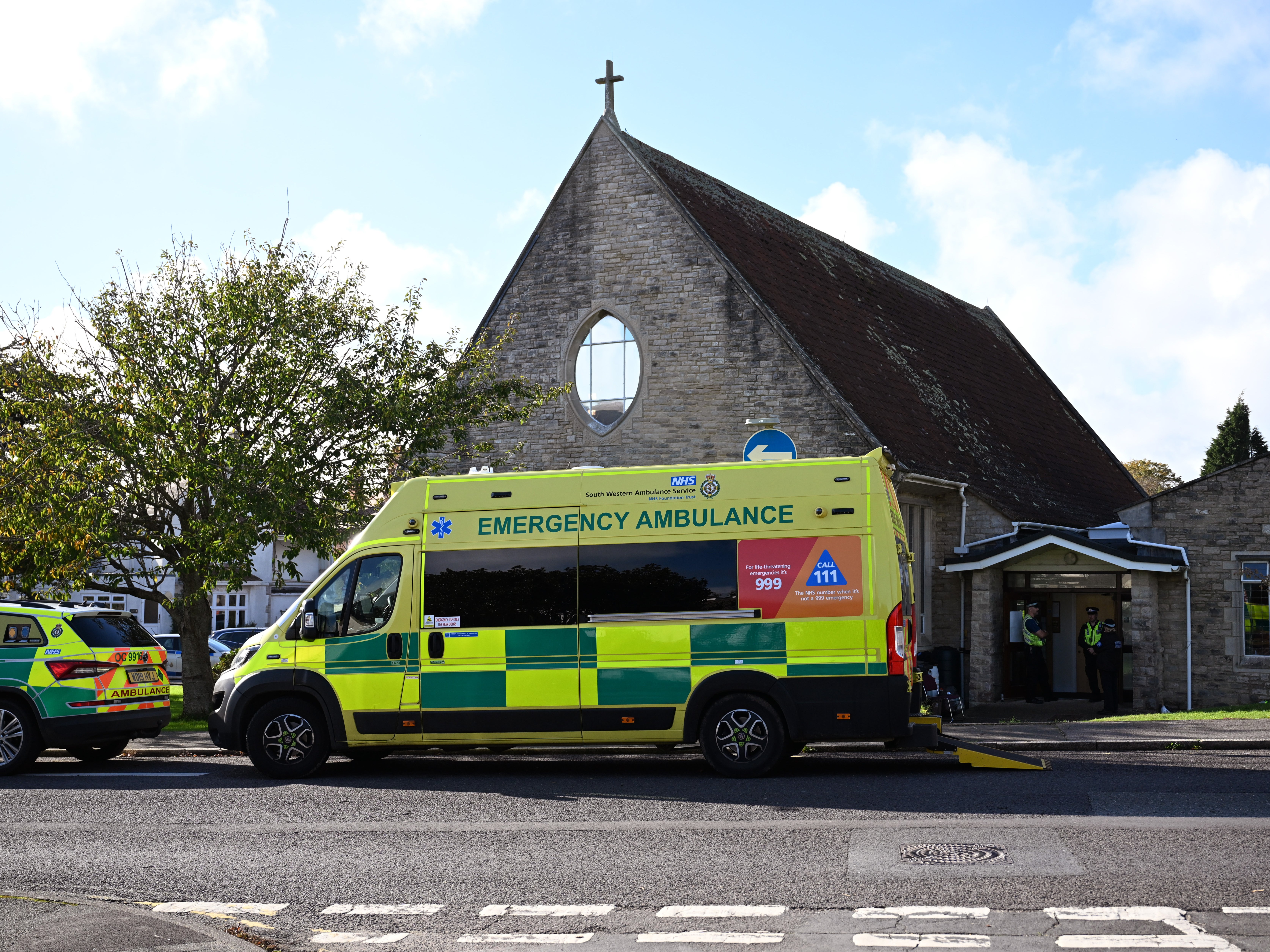 An ambulance outside All Saints church hall