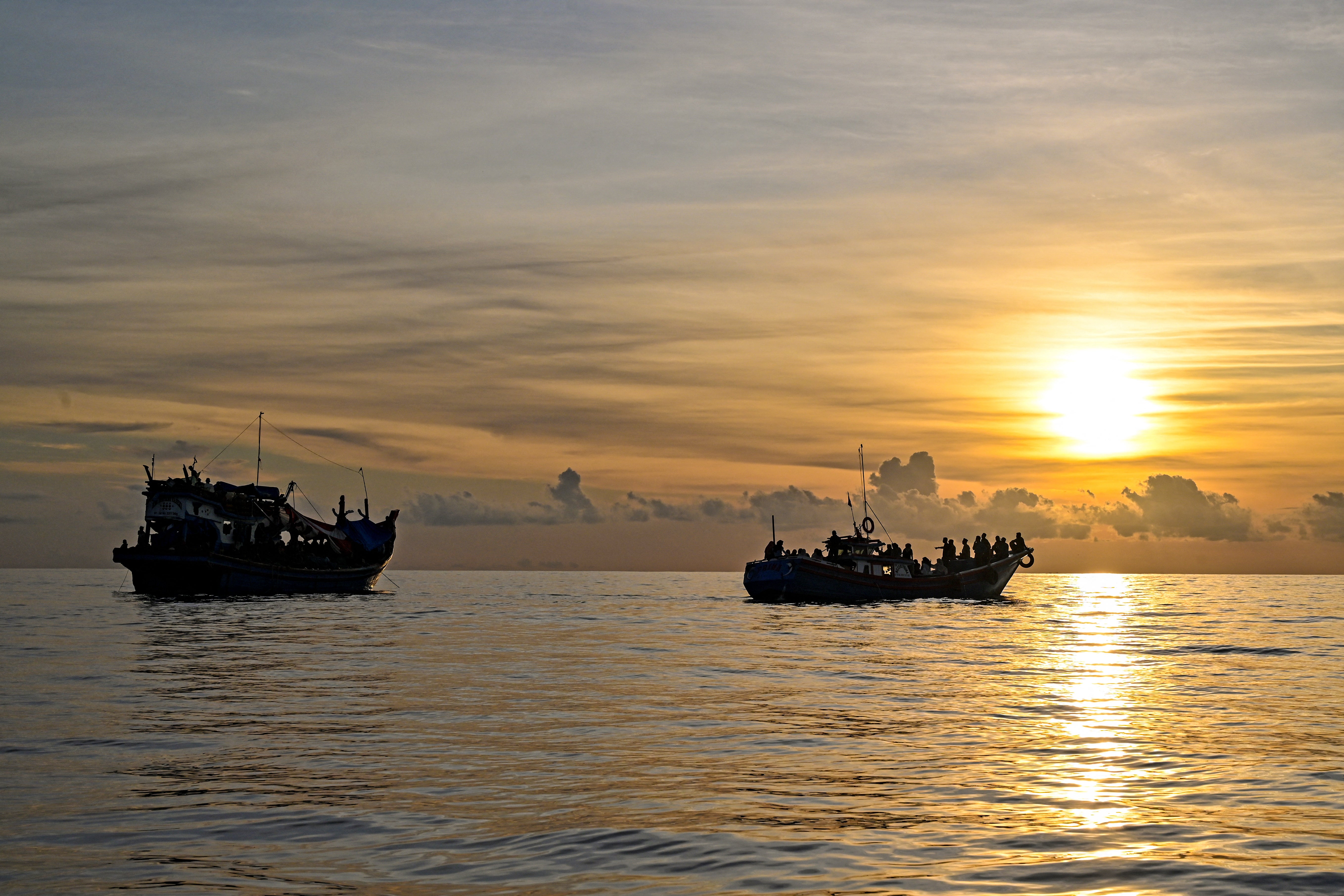 <p>A boat carrying Rohingya refugees sails ashore off the coast of Labuhan Haji in Southern Aceh province on 23 October 2024</p>