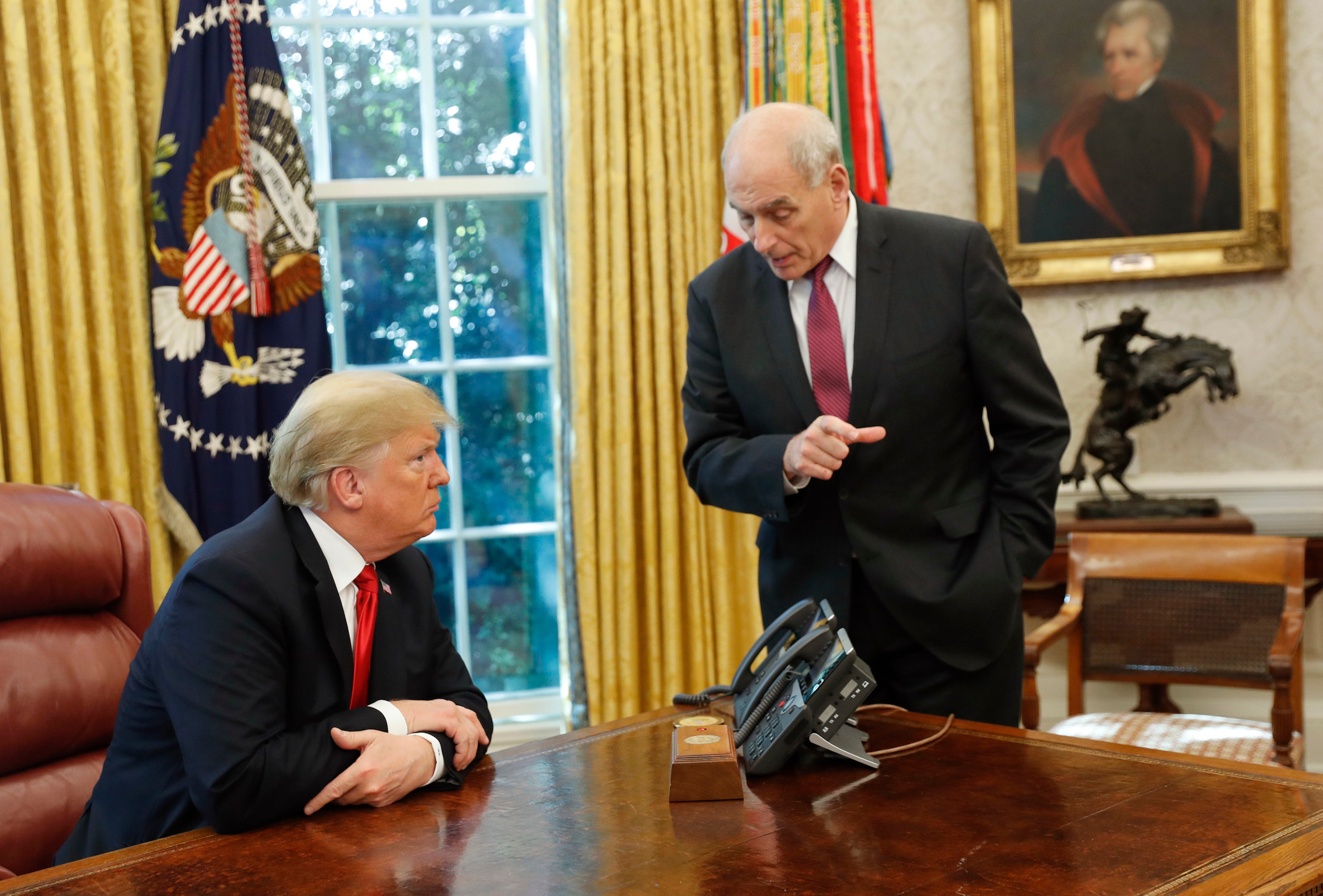 Donald Trump in the Oval Office with former Chief of Staff John Kelly. Kelly raises the alarm about his former boss