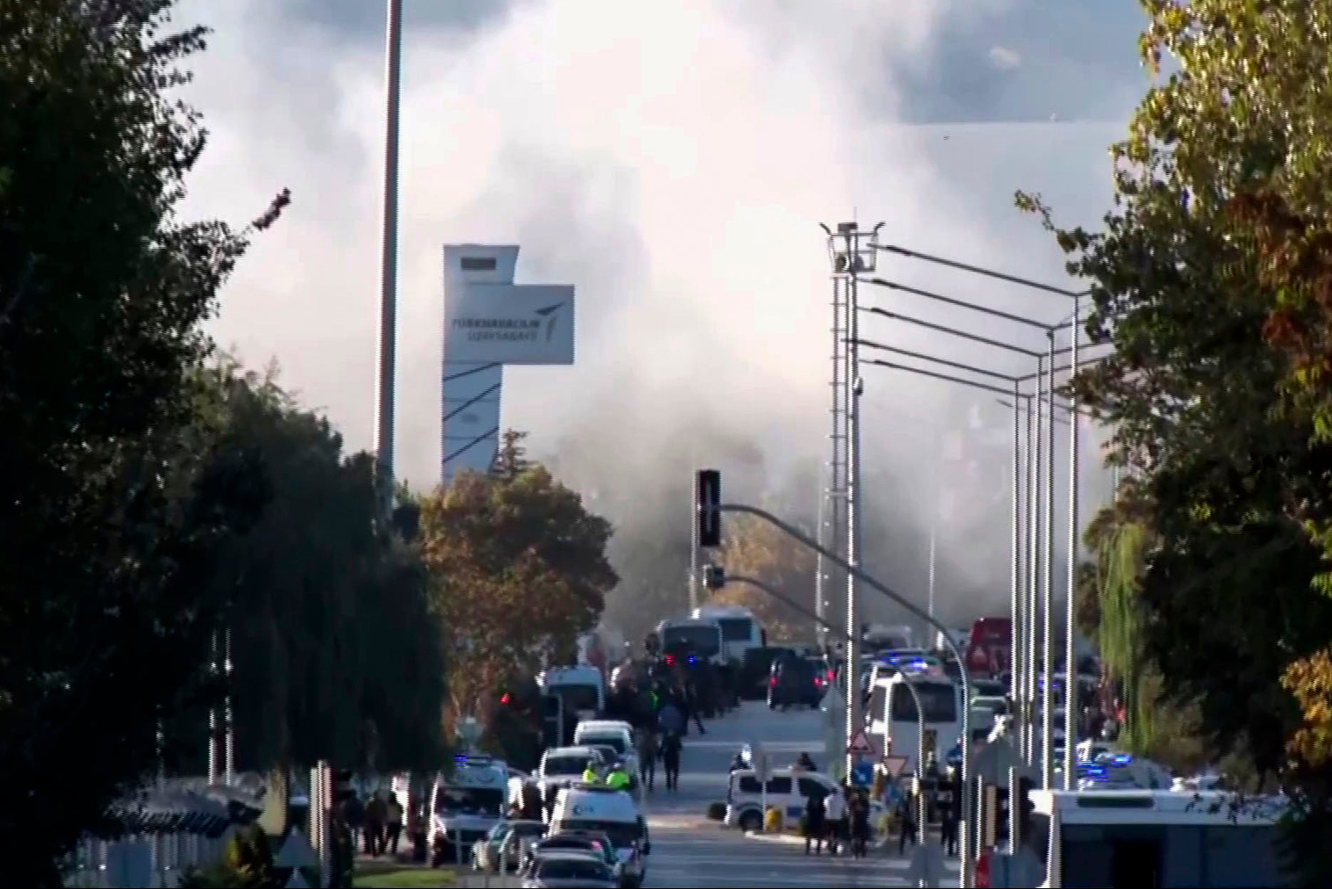 Smoke billows above the aerospace site which was attacked by suspected Kurdish militants