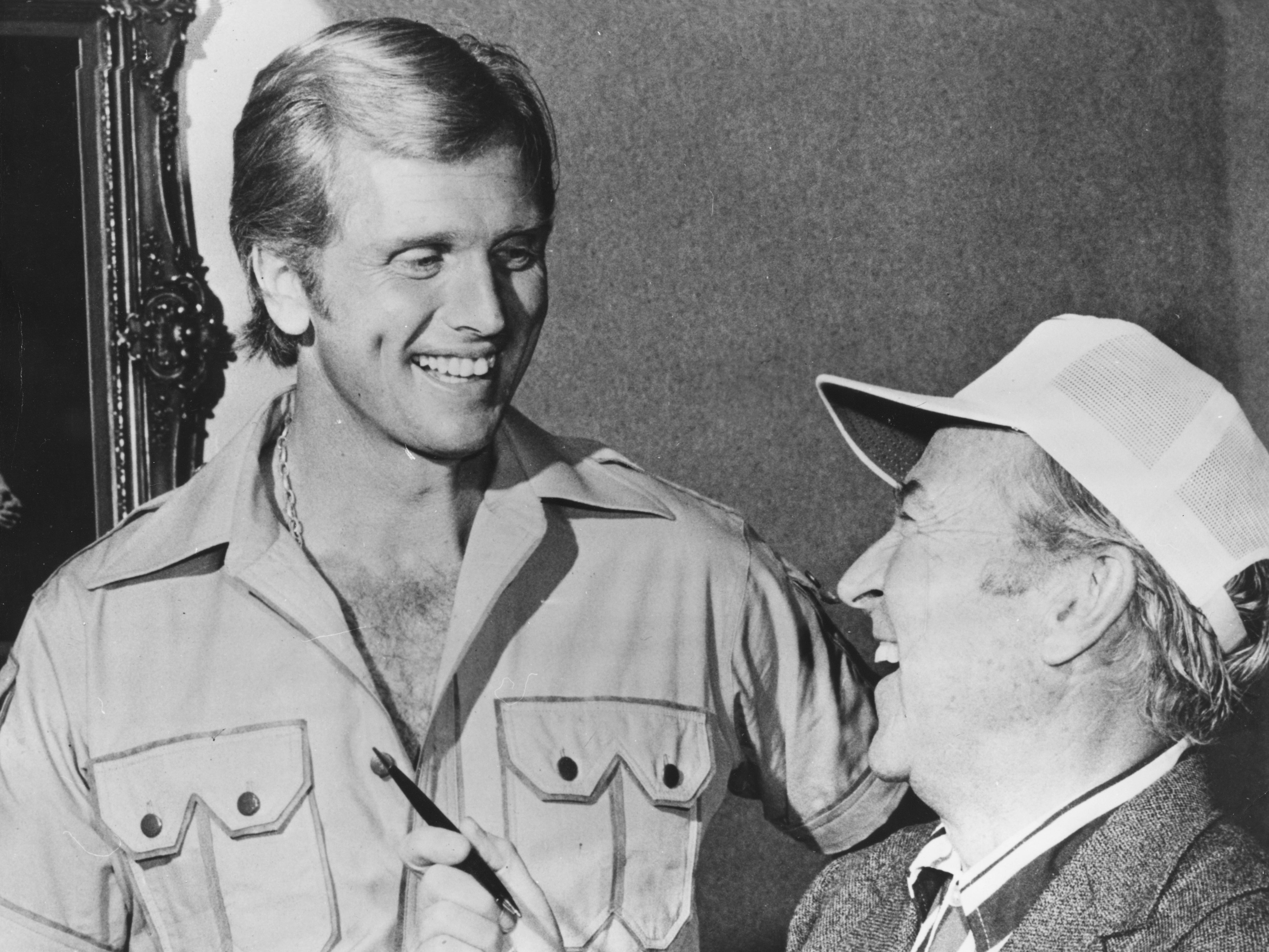 Ron Ely discusses his role in 'Doc Savage: The Man of Bronze' with producer George Pal in Hollywood, circa 1975