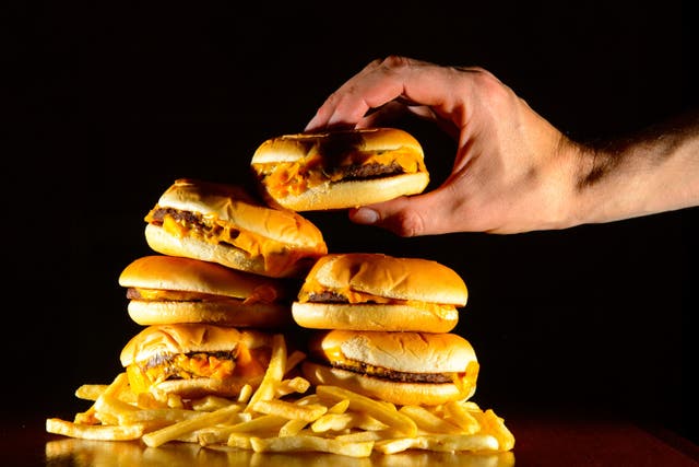 Cheeseburgers and French fries (Dominic Lipinski/PA)