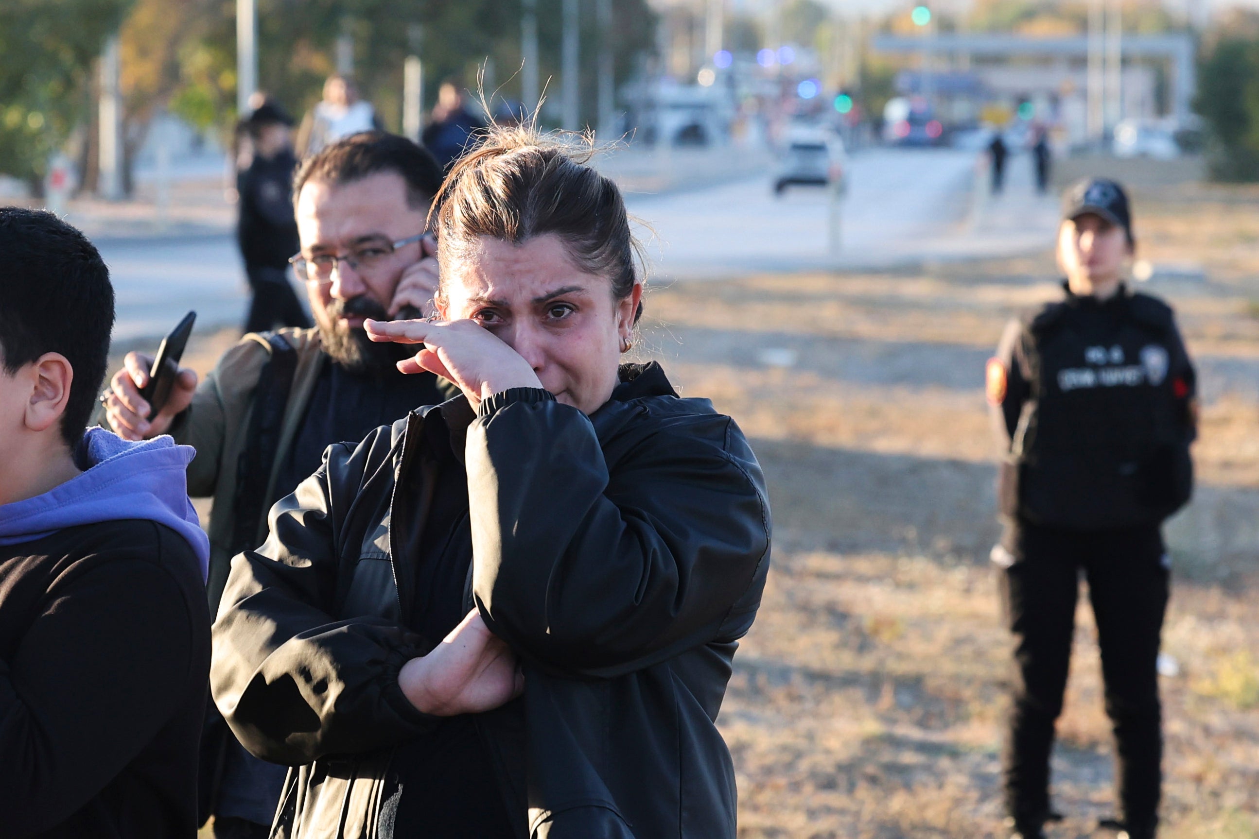 Explosion People gather outside of the Turkish Aerospace Industries building