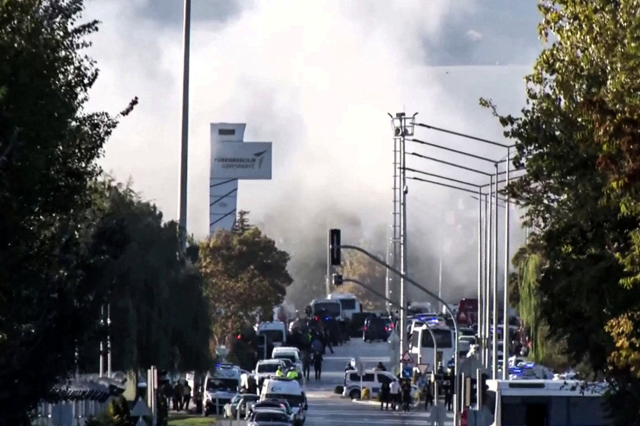 Smoke rises from the headquarters of Turkey’s aviation company TUSAS