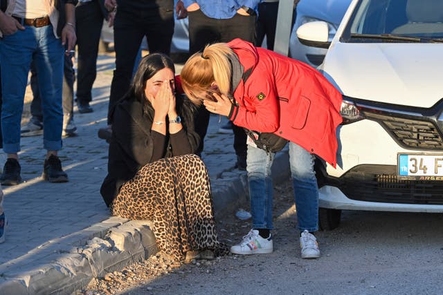 <p>People gather outside of Turkish Aerospace Industries, in Ankara  </p>